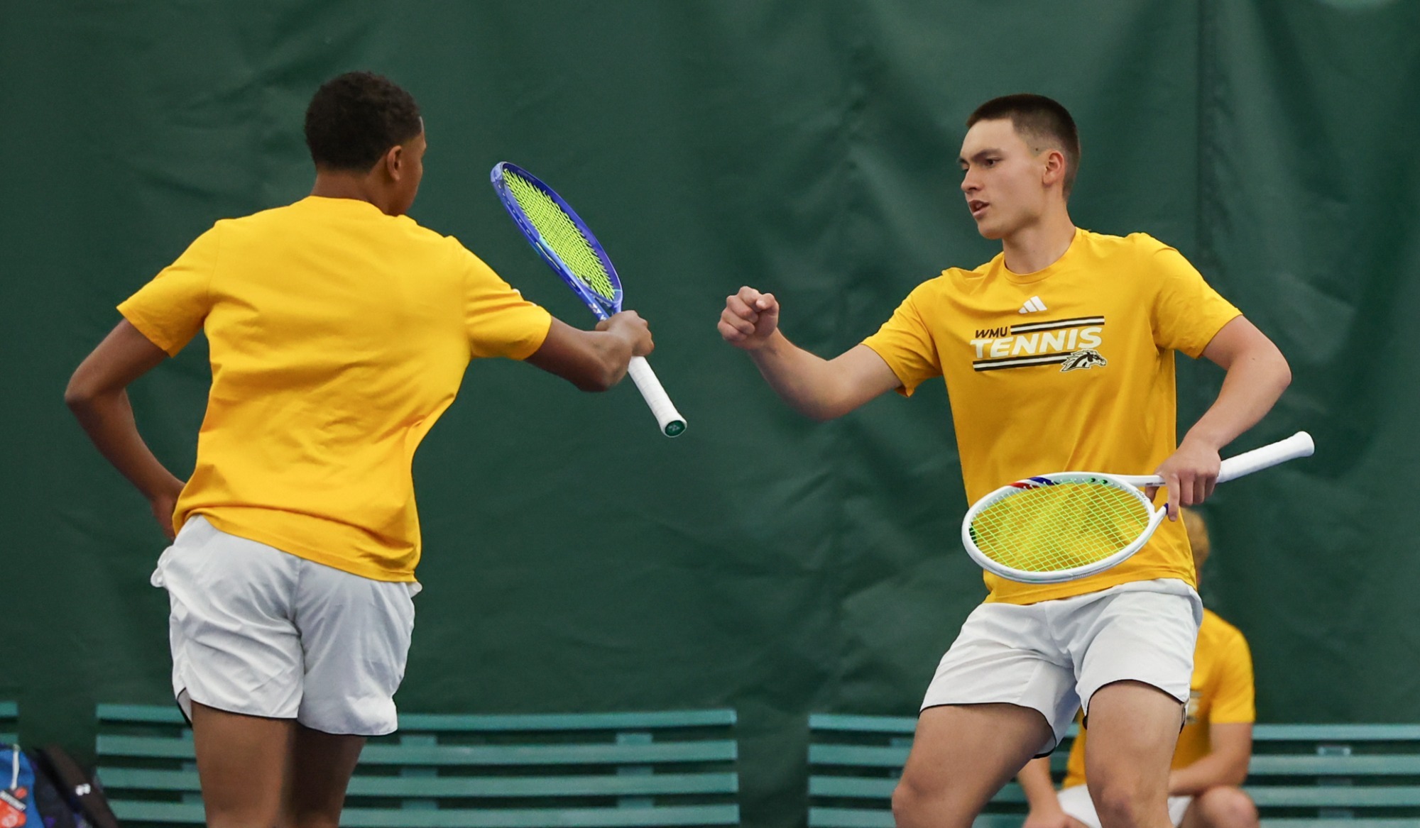 Ashton Adesoro and Jack Davison celebrate a point in doubles. 