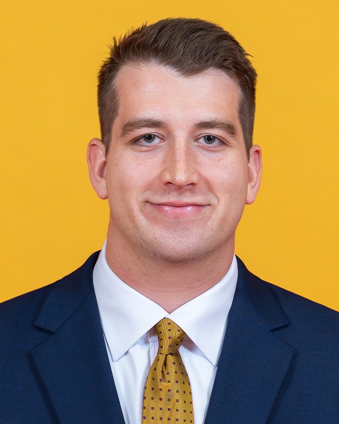 Headshot of men's basketball director of operations Adam Howard