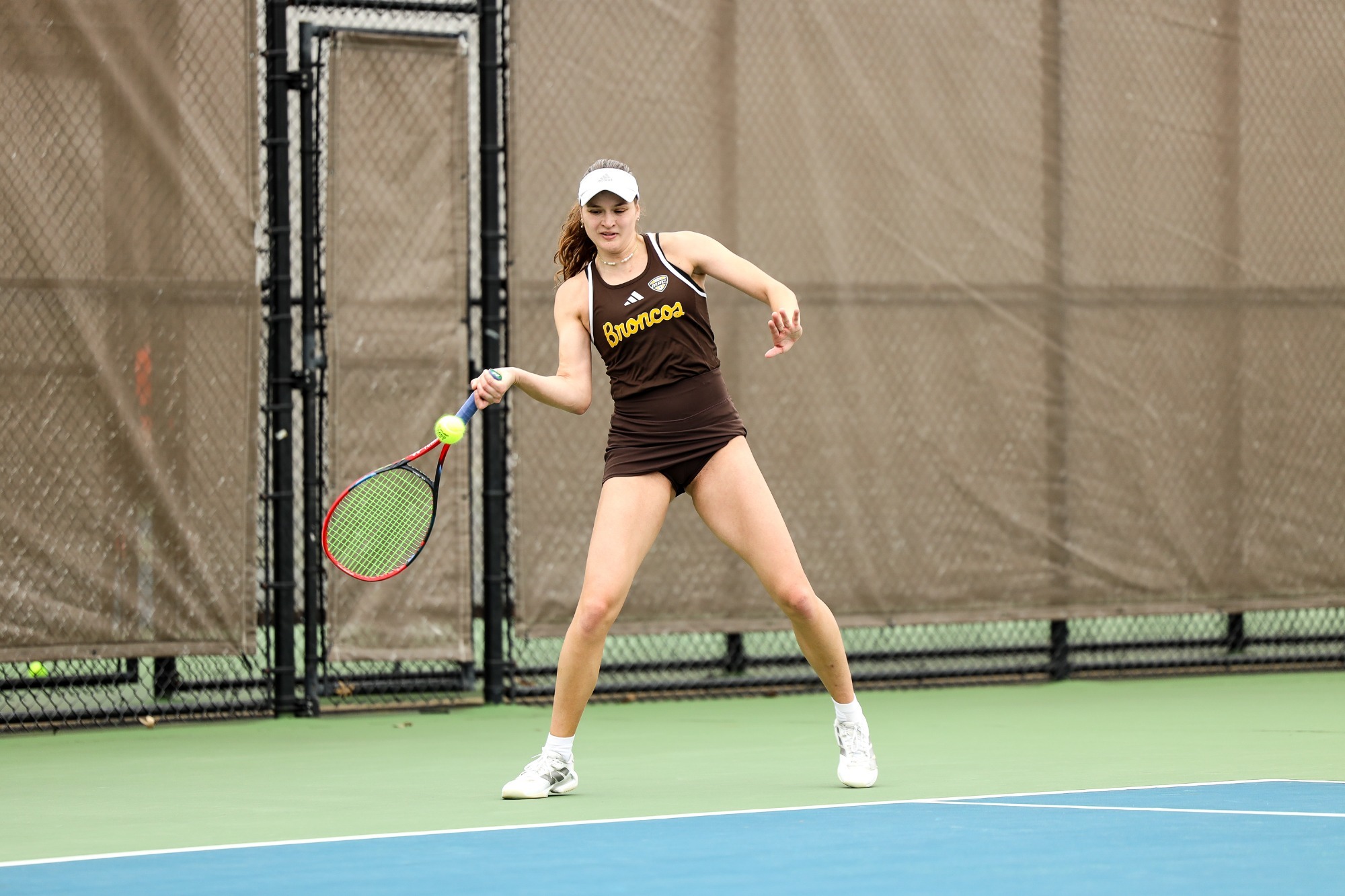 Lola Glantz returns a serve in WMU's win over Bowling Green.