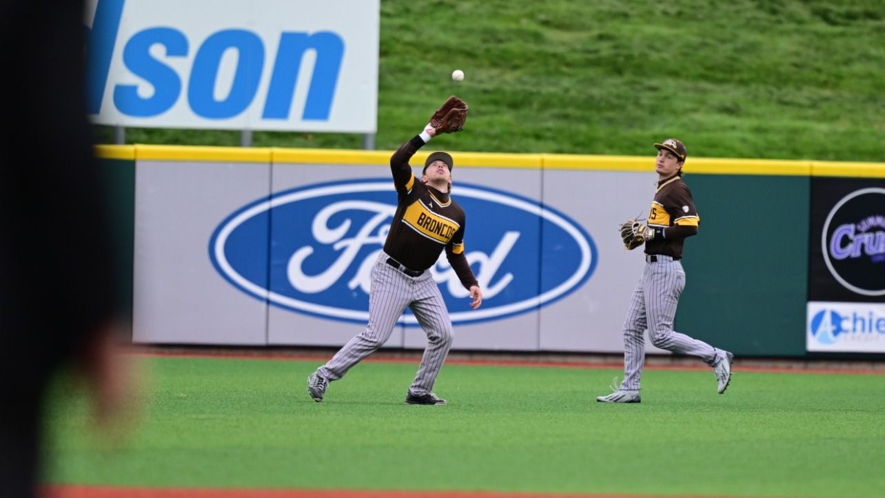 Mark Mennecke catches a fly ball in game one of the MAC Tournament against NIU