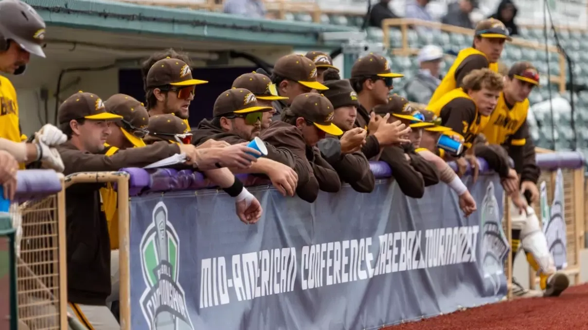 The Western Michigan dugout looks on during its MAC Tournament game against Kent State