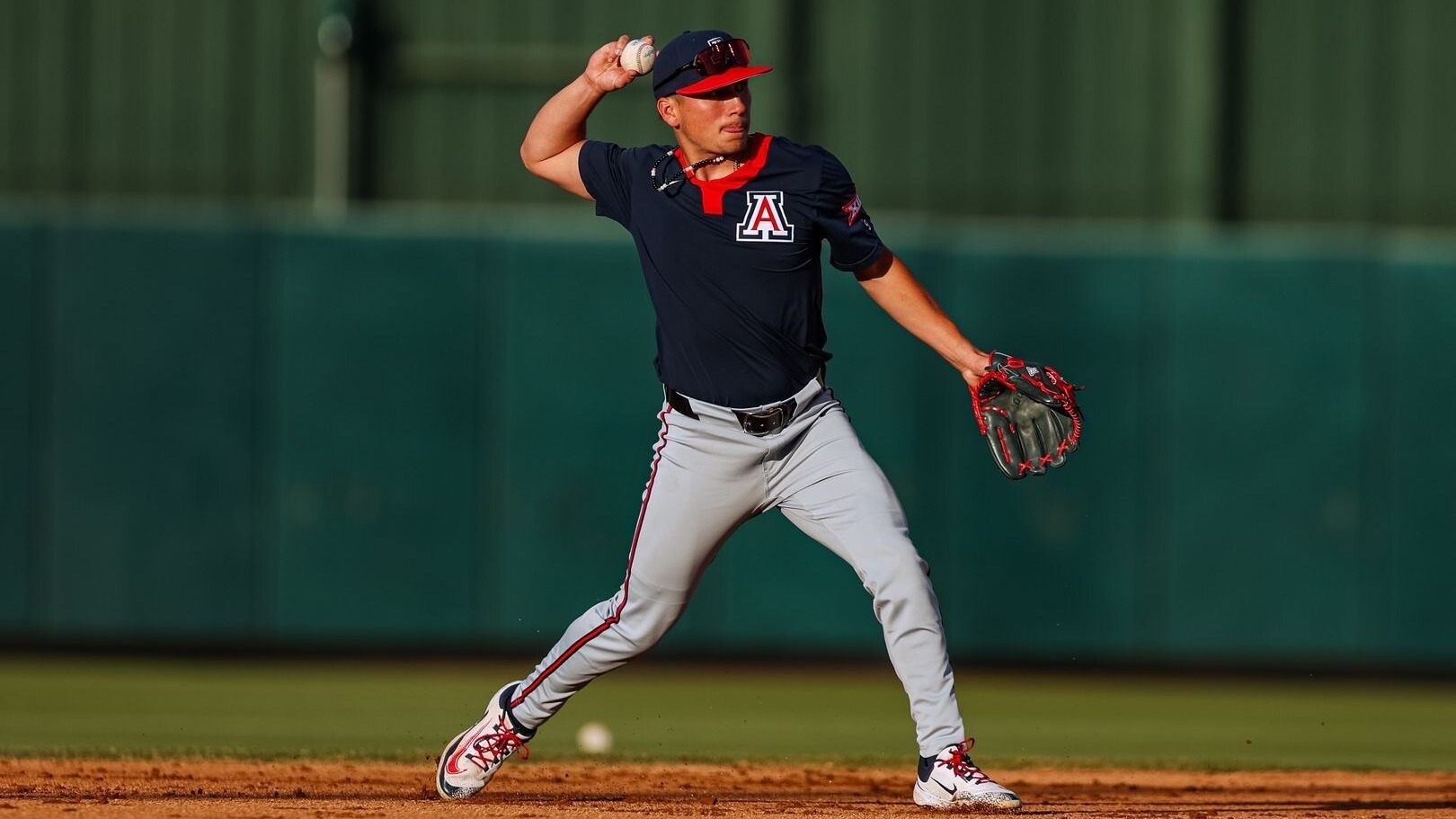 WMU baseball transfer infielder Ethan Guerra makes a throw while playing at Arizona