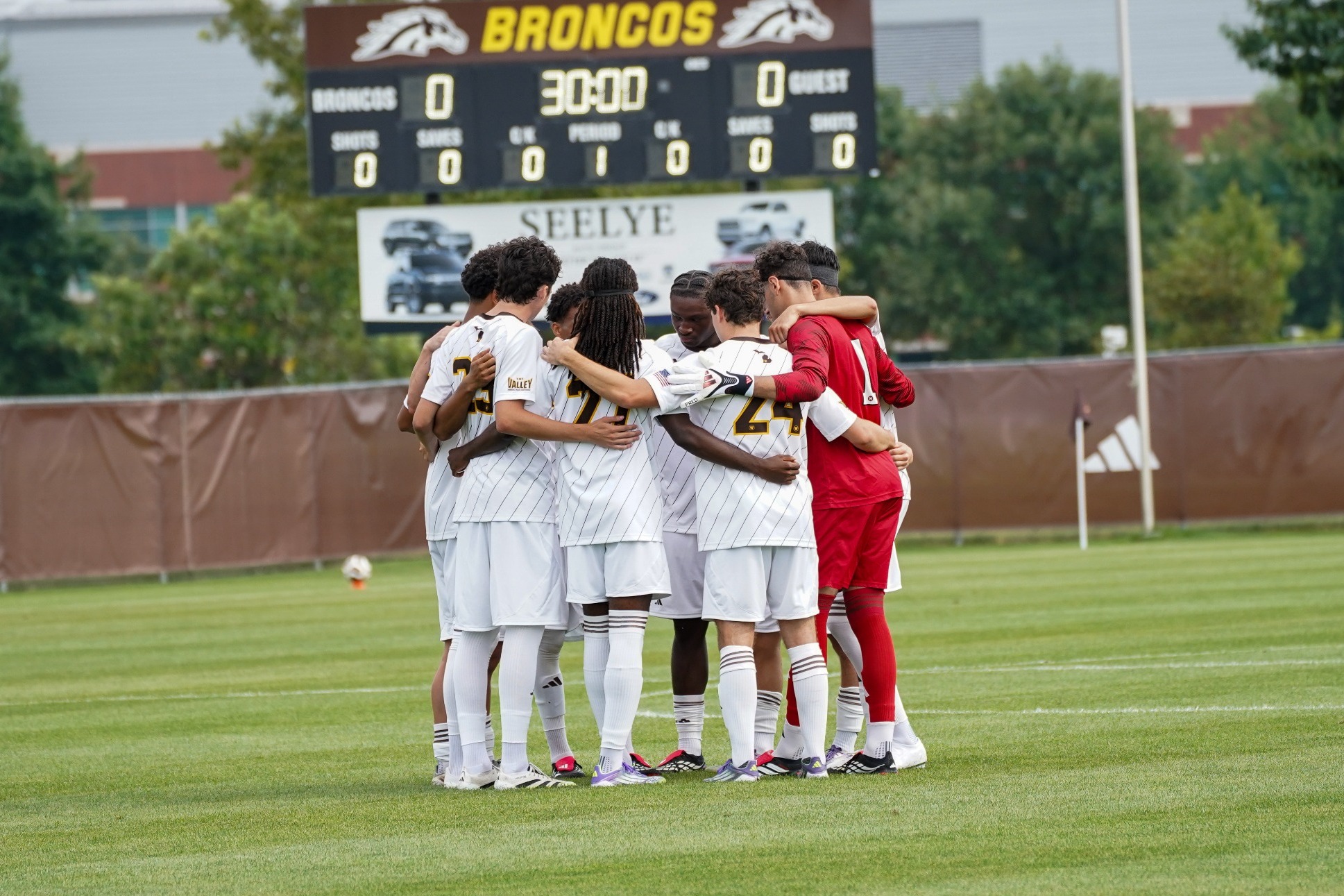 Gold team huddle at the 2026 men's soccer Brown and Gold exhibition