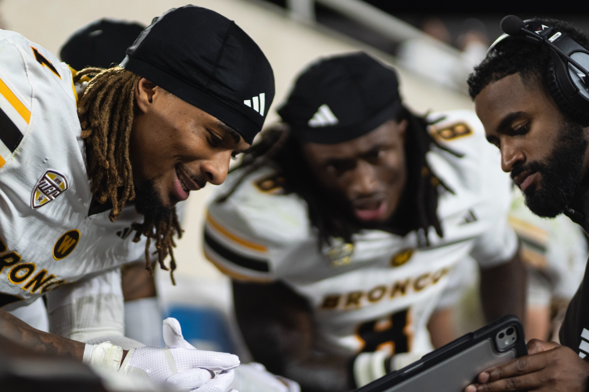 Joshua Franklin and Jarvarius Sims breakdown plays with cornerbacks coach Nick Coleman