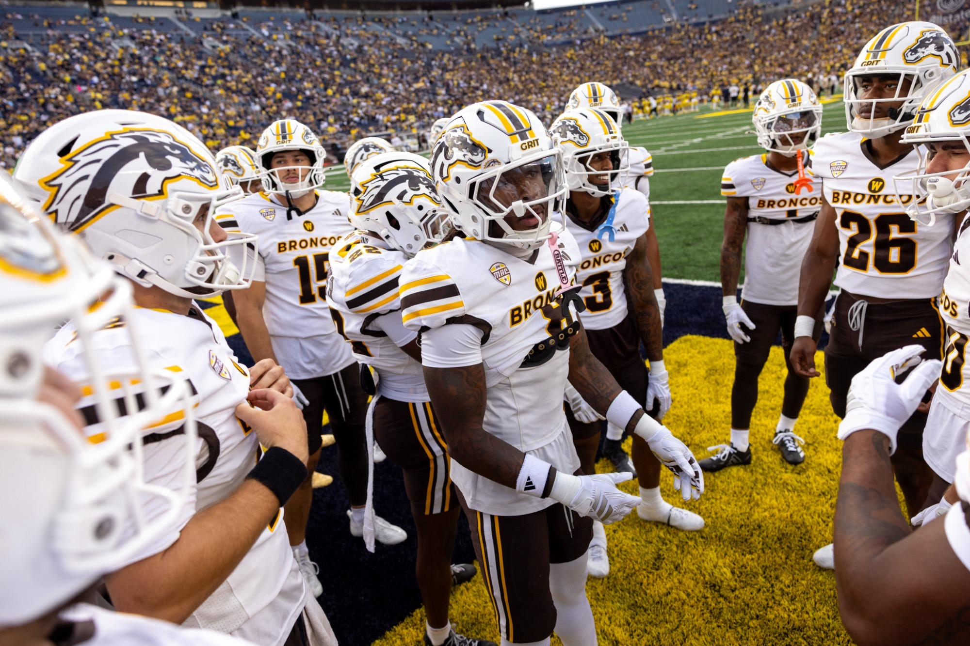 Group huddle vs. Michigan