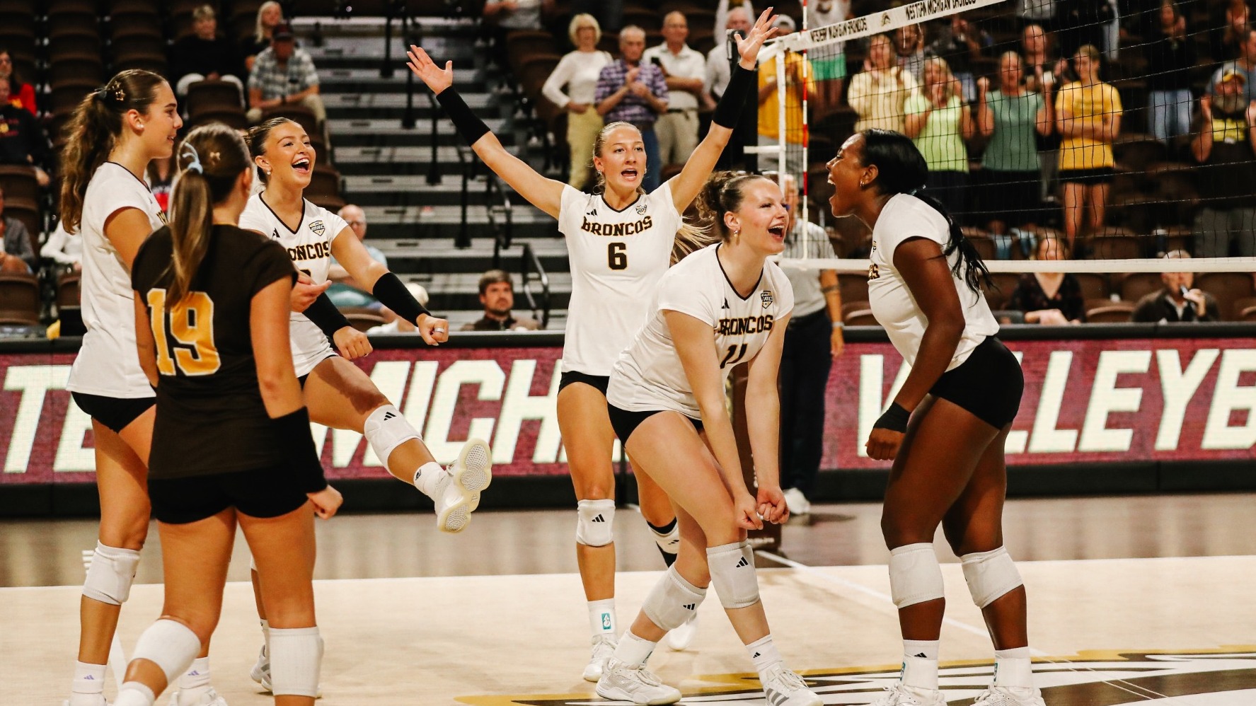 The Broncos celebrate after winning a point against Ferris State