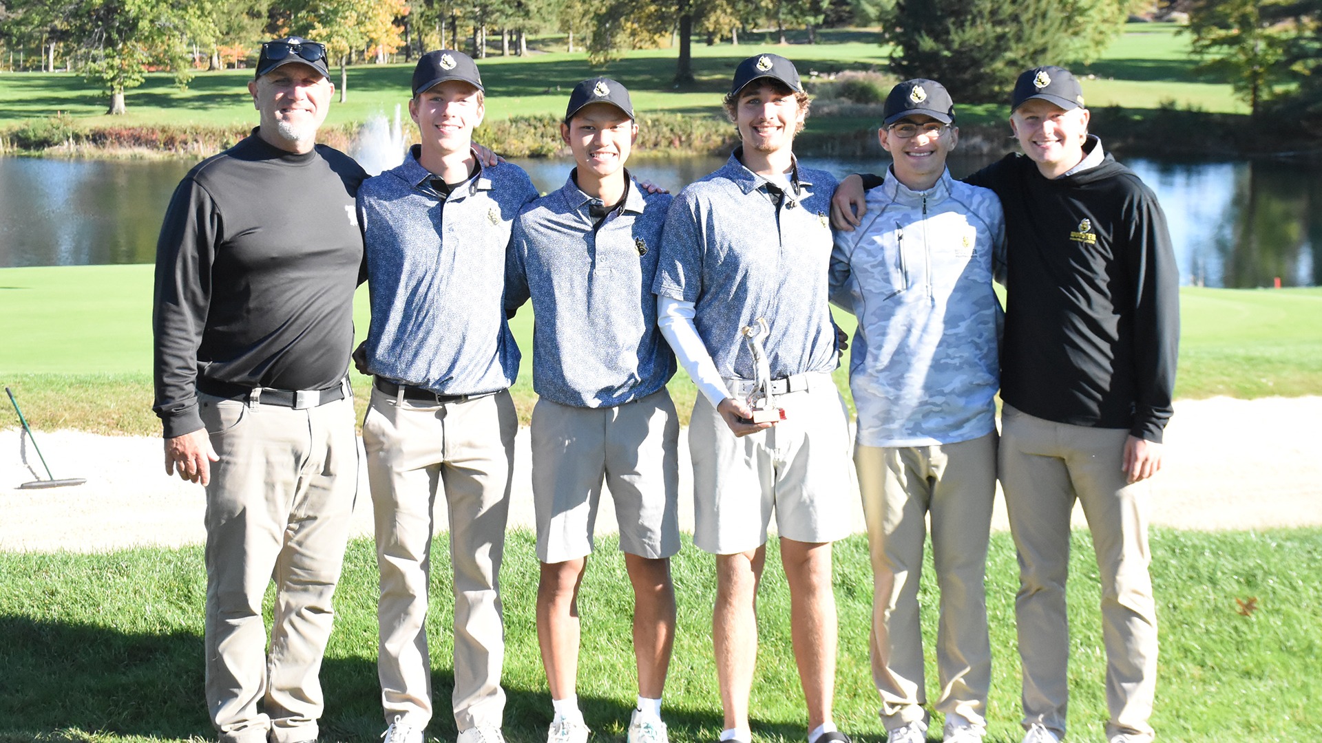 Wooster men's golf with the Cleveland Cup trophy - Rich Danch, Jack Kinder, Nunth Khamkhokgruad, Mark Towns, Jake Cammarata, Andrew Carey