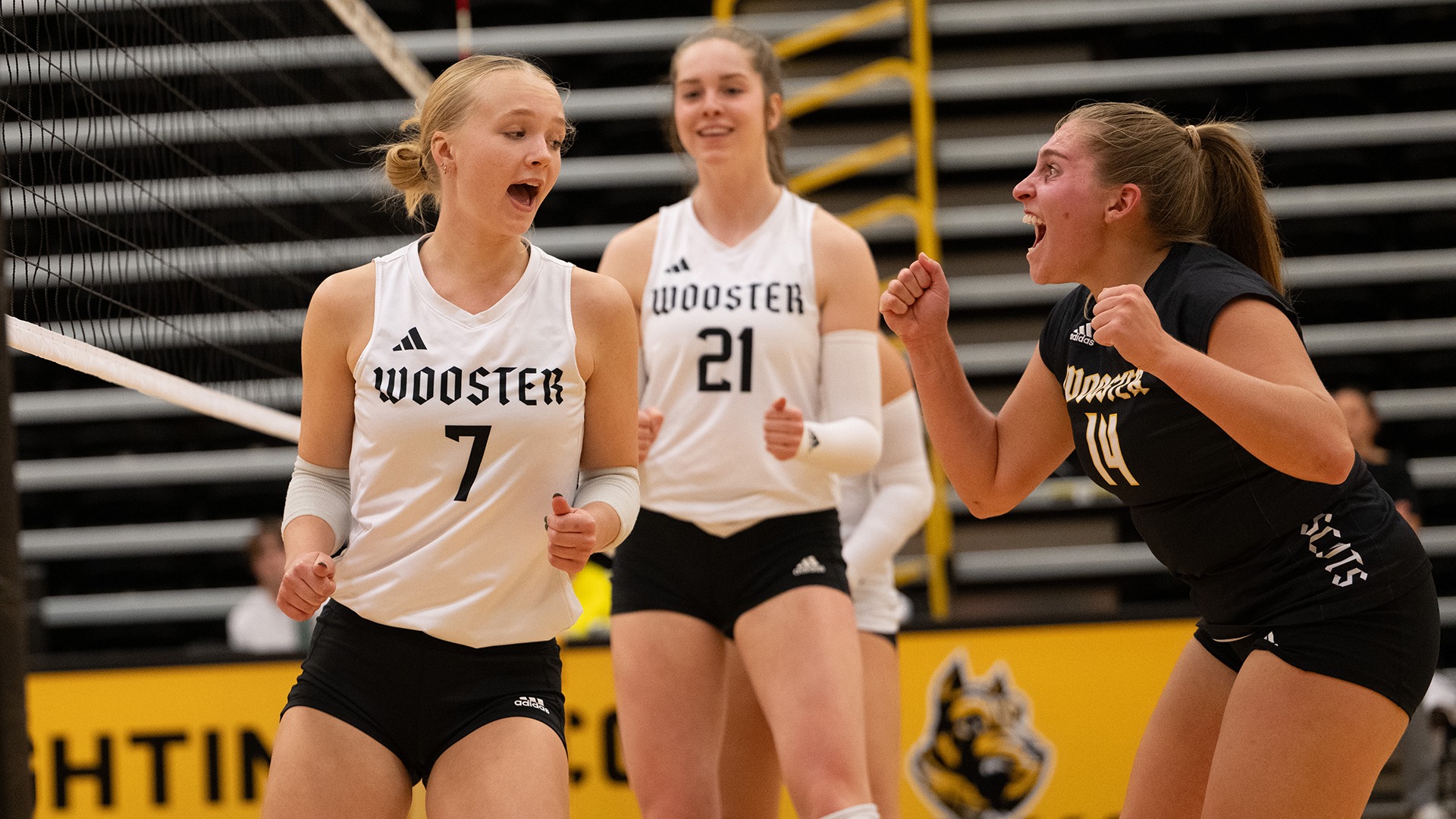 Jordan Laraway celebrates a Wooster point with teammates in a 2025 match.