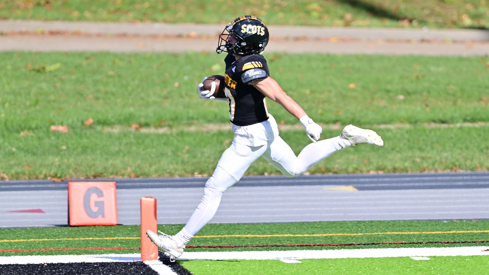 Louie Lindsay returns an interception for a touchdown against Kenyon in 2025.