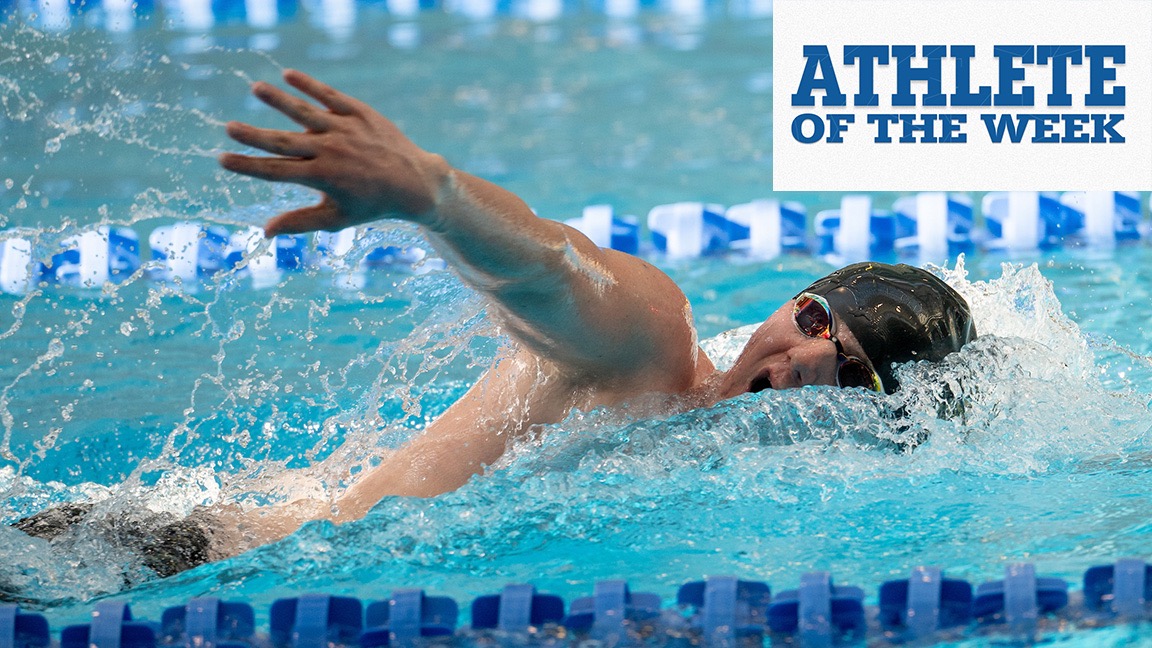 Evan Hasenkampf swims during the Wooster Invite