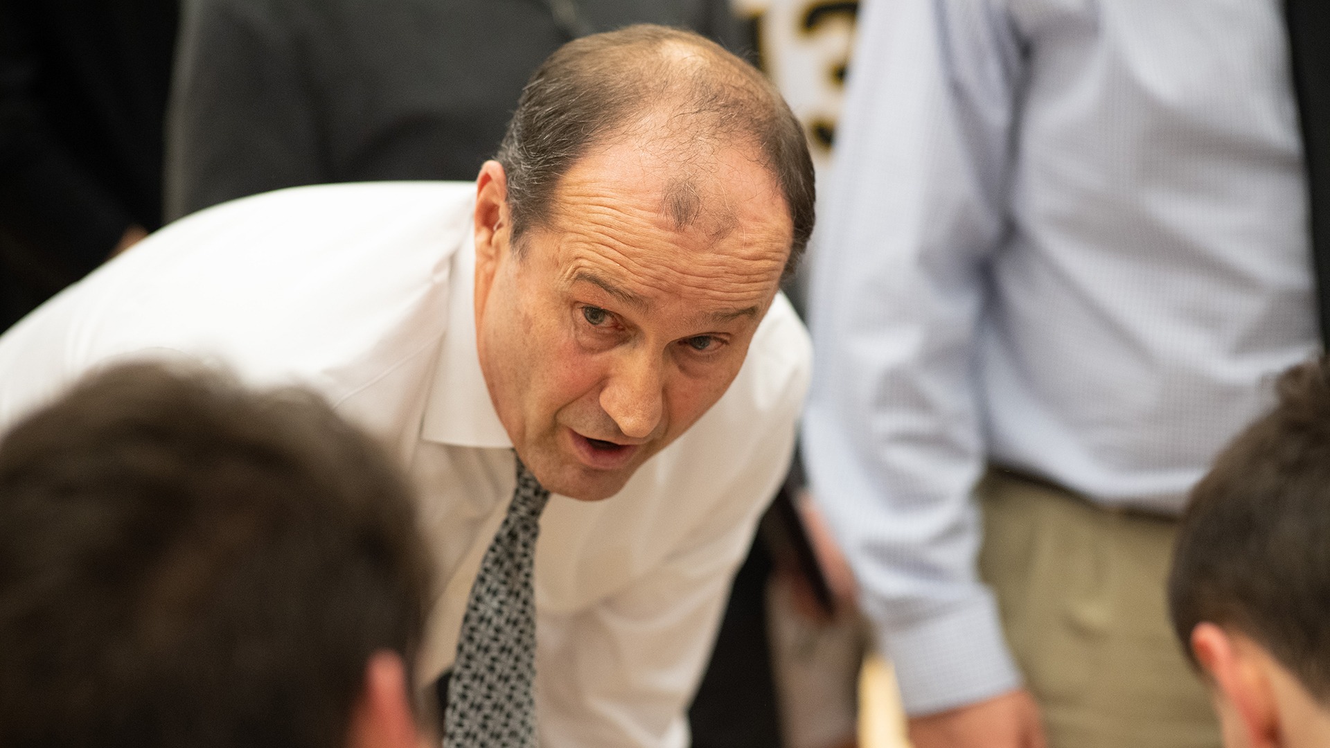 Steve Moore instructs Wooster's team during a 2020 game