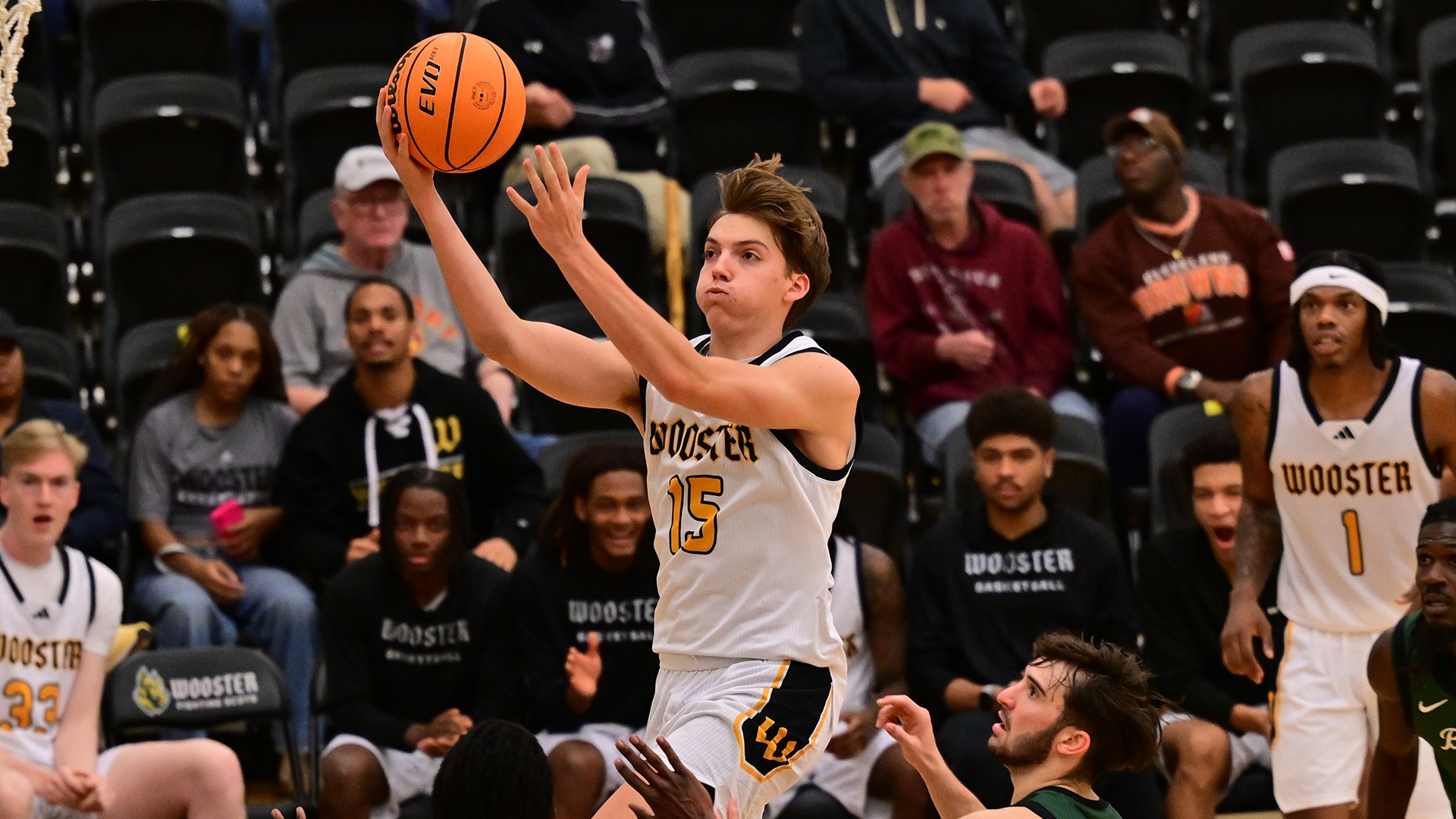 Breckman Oakley drives in for a layup against Brockport in a 2025 game