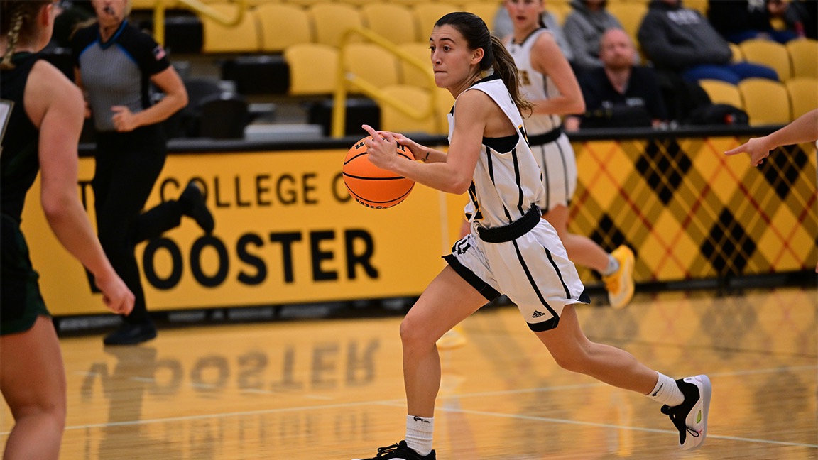Mackenzie Riccitelli drives toward the basket