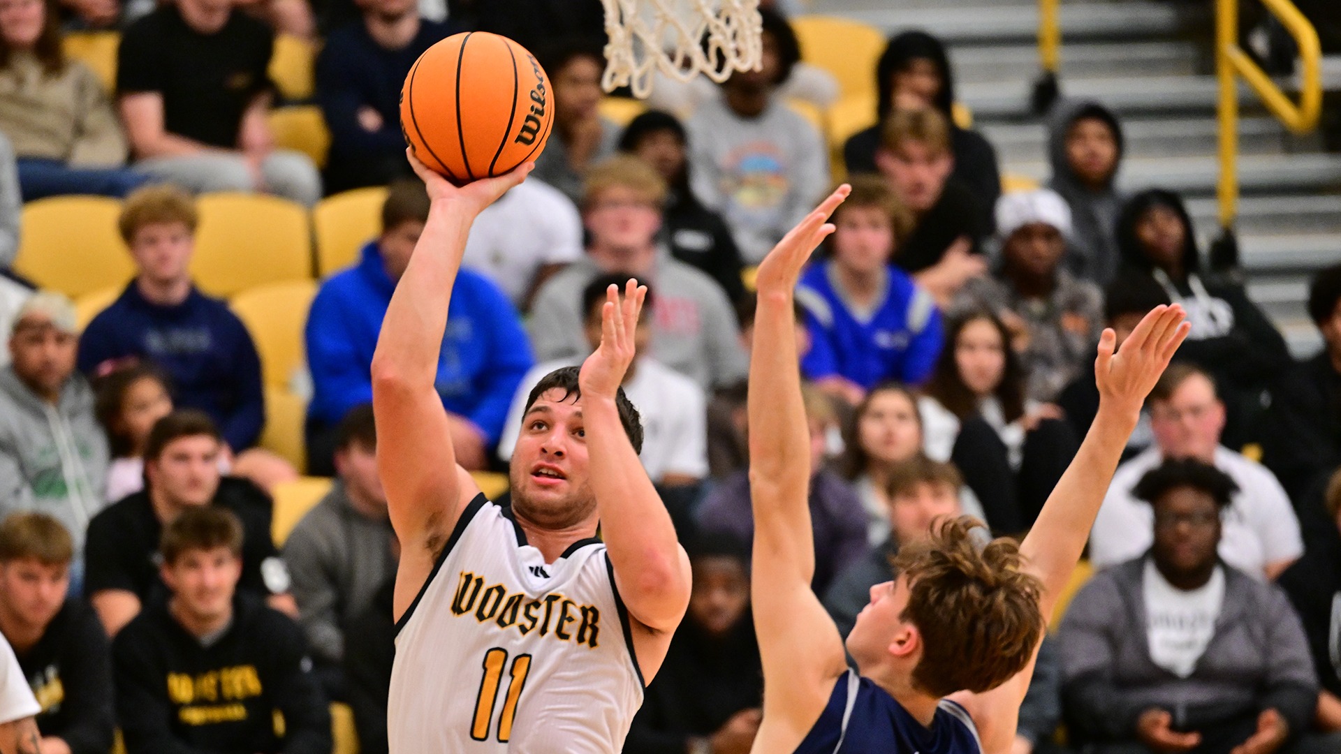 Isaac Roeder goes up for a layup against Geneseo in a 2025 game.