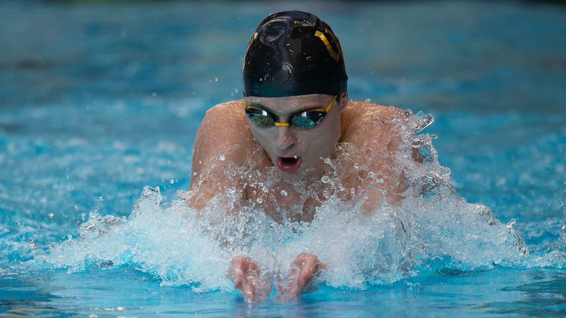 Hayden Price swims in the 200 individual medley at the 2025 Wooster Invitational