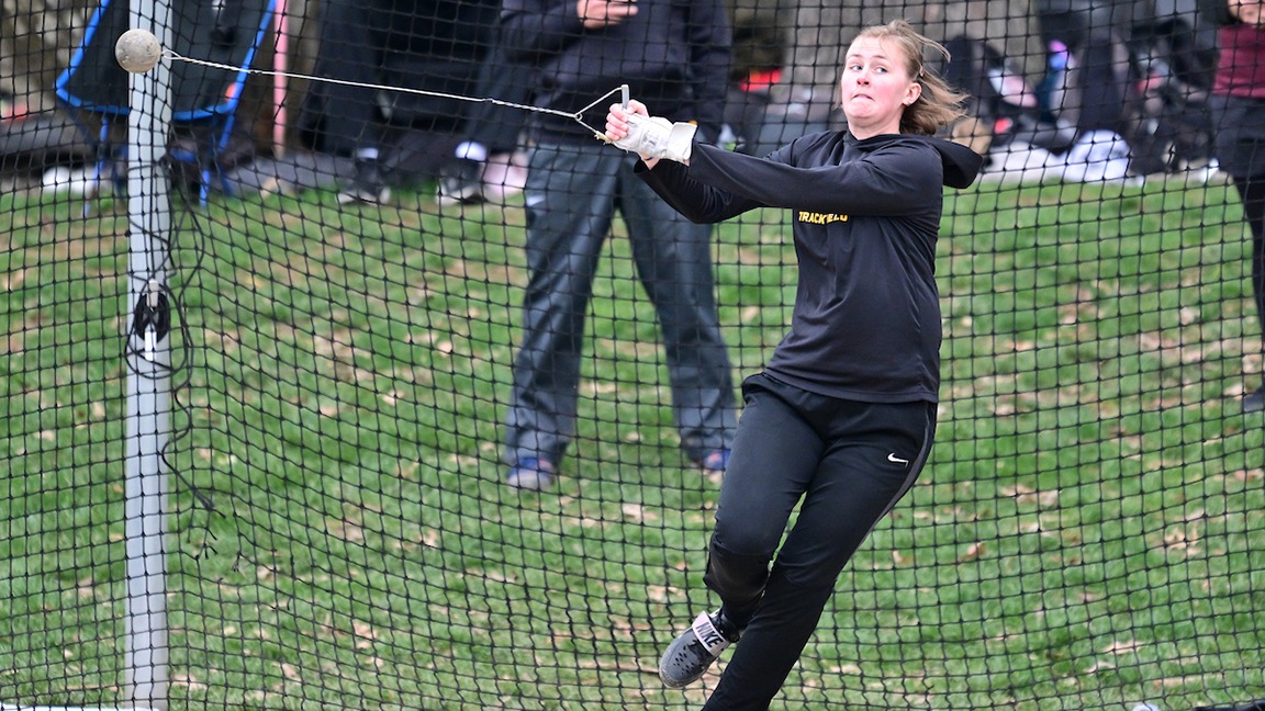 Evie Sanford competing in the hammer throw