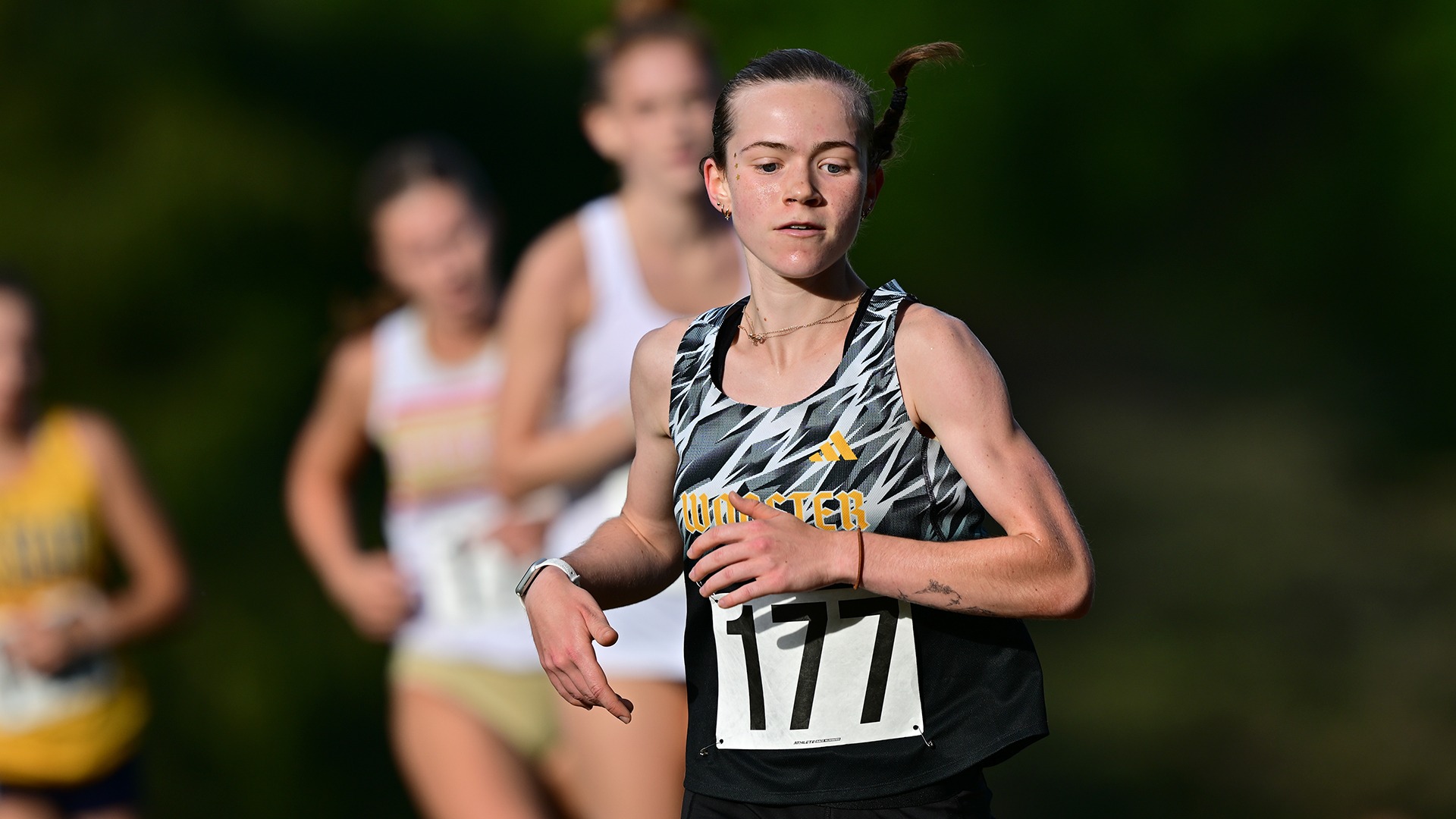 Lauren Acker action photo running at Wooster Invitational