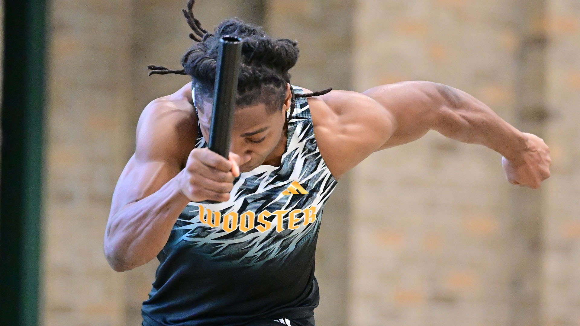 William Harris II races in the 4x200 relay at the 2026 Wooster Invitational