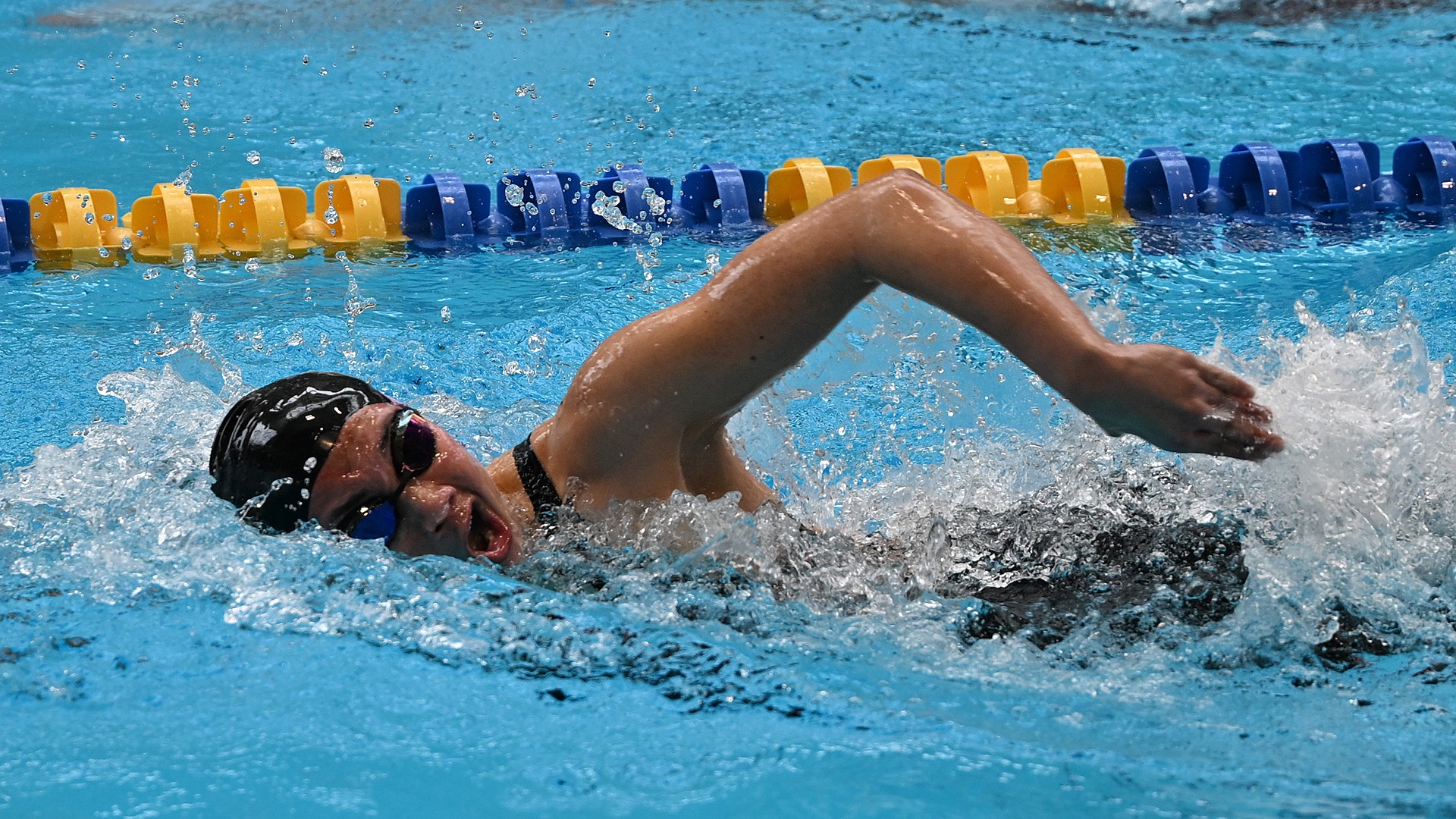 Aryanna Harton swims the freestyle during the 2025 Wooster Invitational