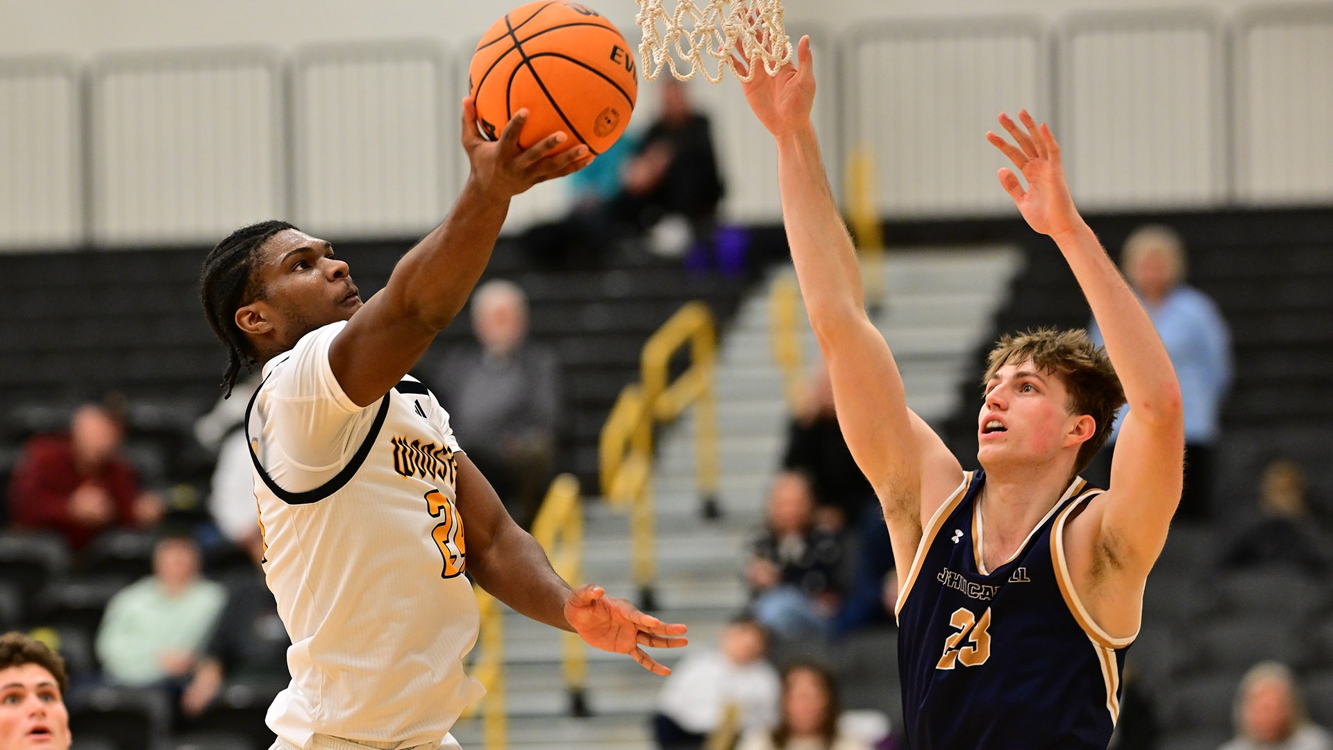 Quincy Jones goes up for a layup against John Carroll in a 2025 game