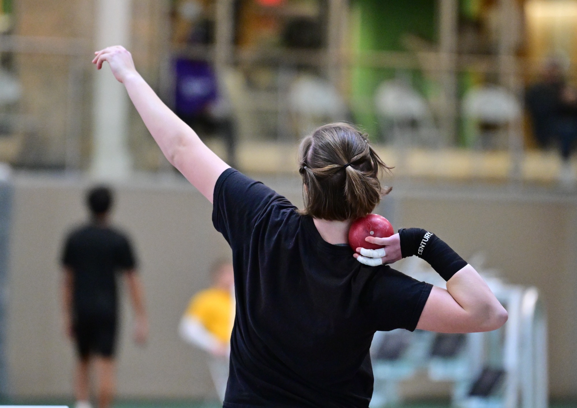 Evie Sanford throws in a field event during Wooster's home meet on Jan. 17, 2026
