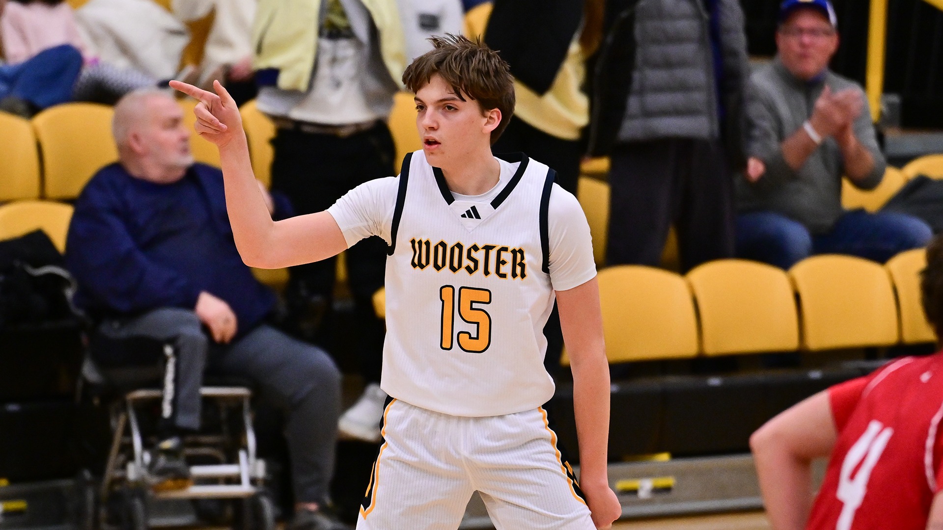 Breckman Oakley reacts to making a 3-pointer against Wittenberg in 2026