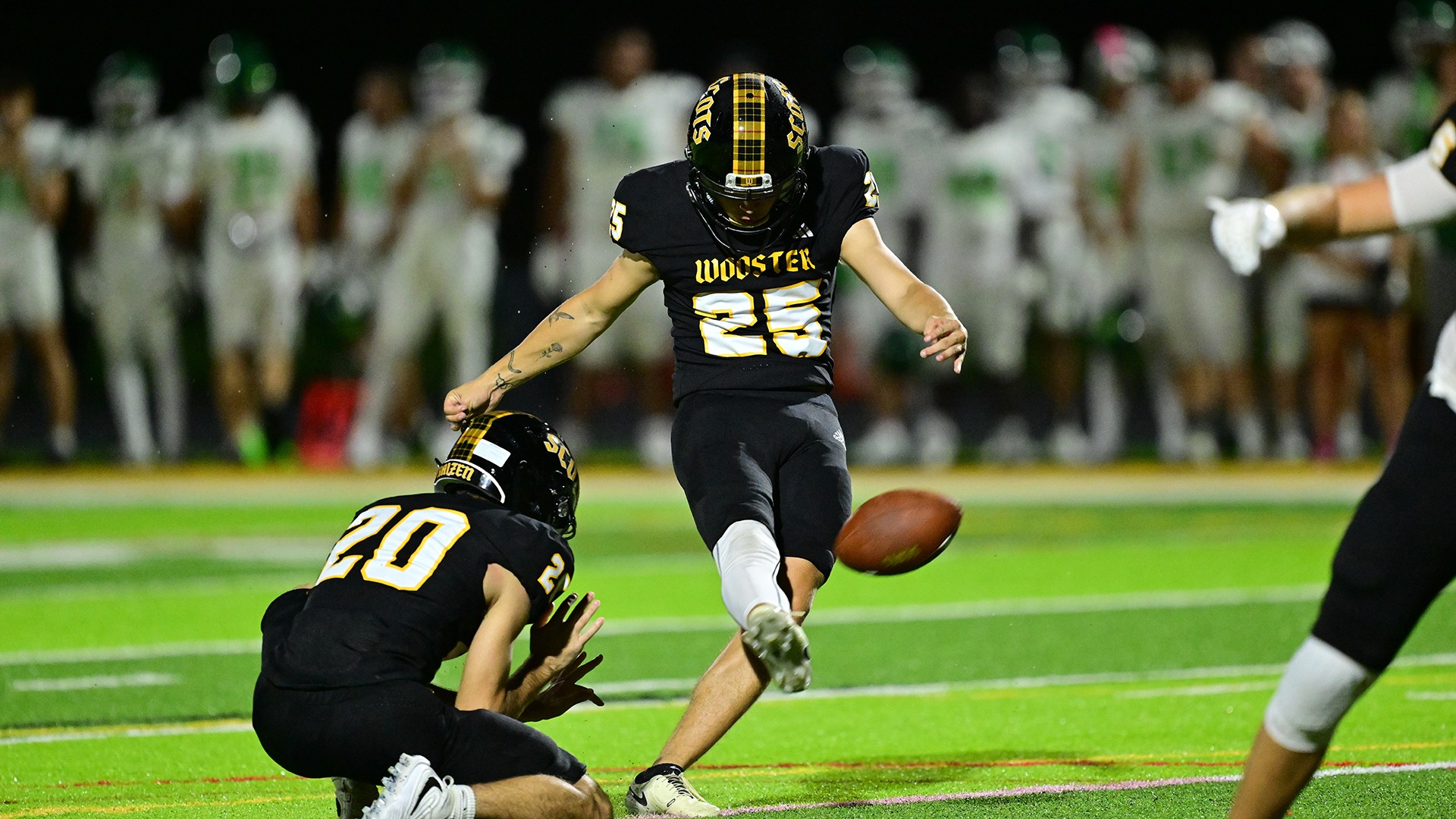 action photo of Nolan Hendricks kicking the football during the 2026 game against Wilmington