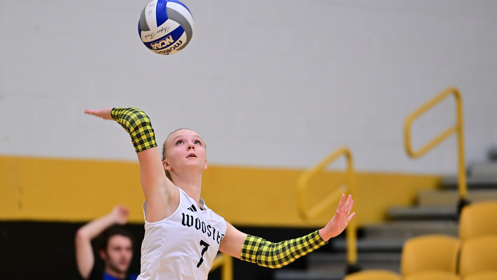 action photo of Jordan Laraway serving the volleyball against Kenyon during a 2026 match