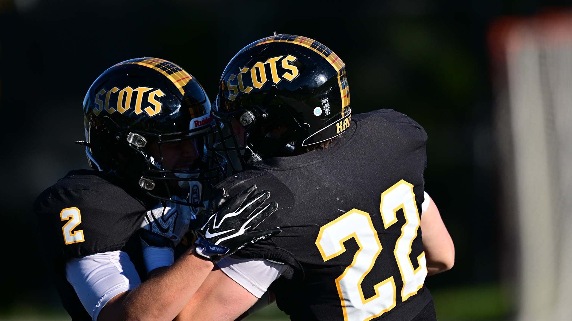 action photo of Grady Harban celebrating his interception return touchdown against Oberlin in 2026