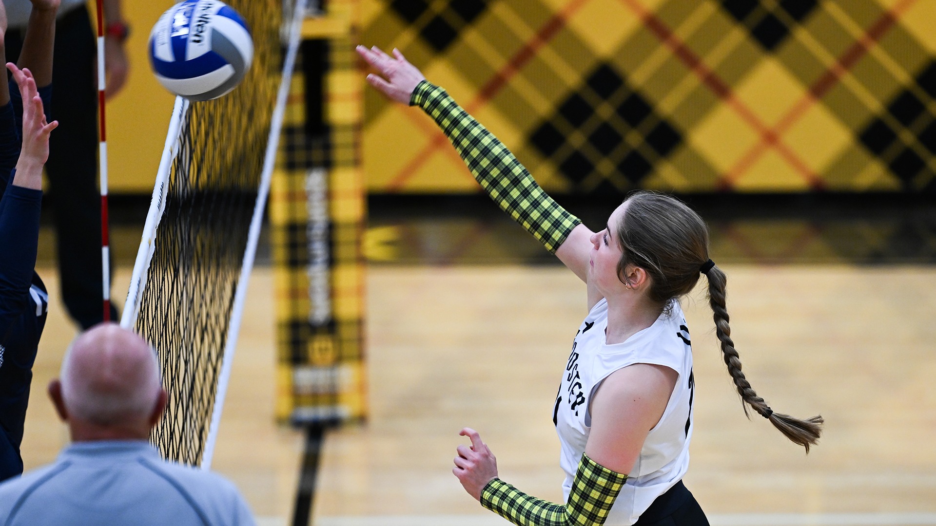 action photo of Kora Burill attacking the volleyball in a 2026 match