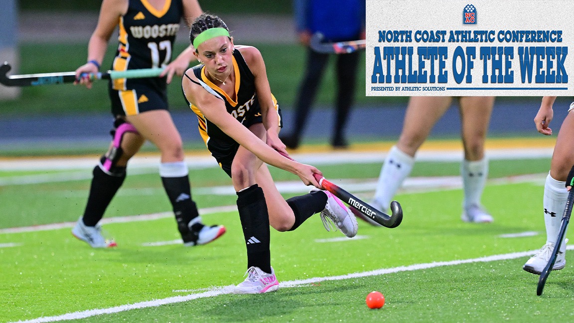 Izzie Kline sends a ball forward. The NCAC AOTW logo is in the top, right corner.