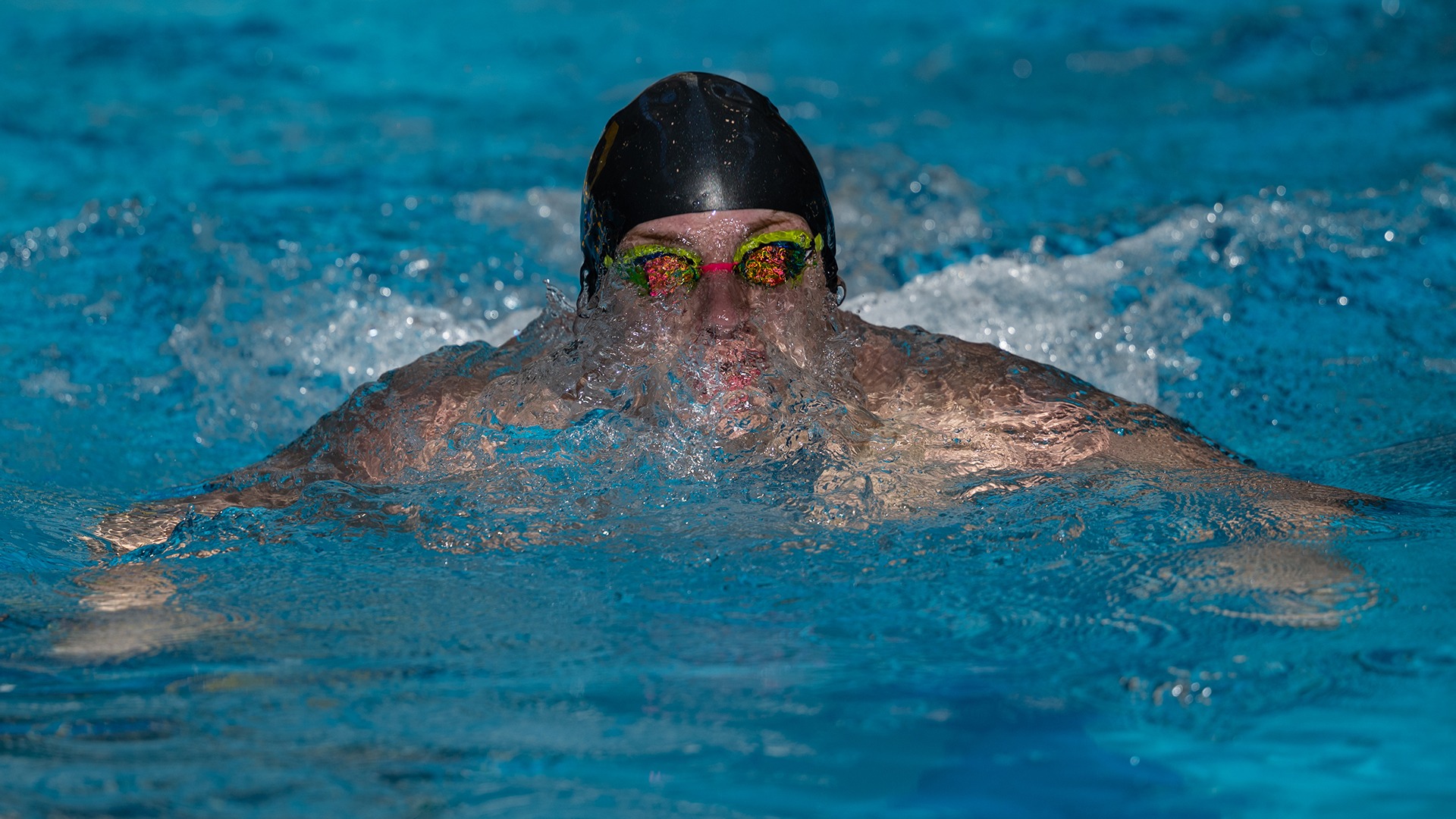 Boston Sullivan swims the breaststroke during the 2025 Wooster Invitational