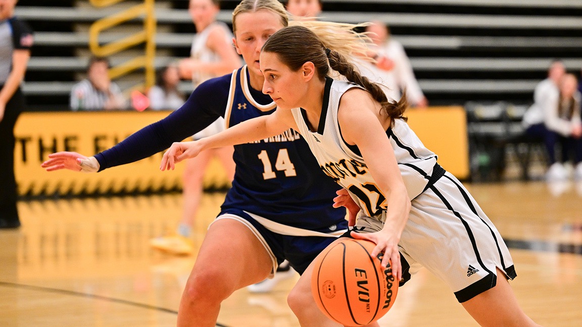 Ella Dean drives to the basket against a defender