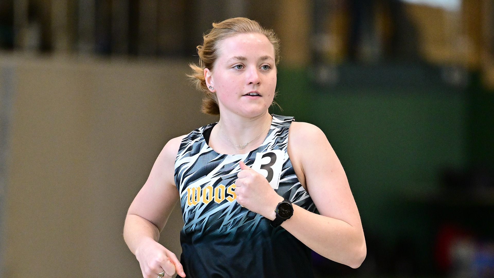 Zanna Anderson runs in an event at a home 2026 meet