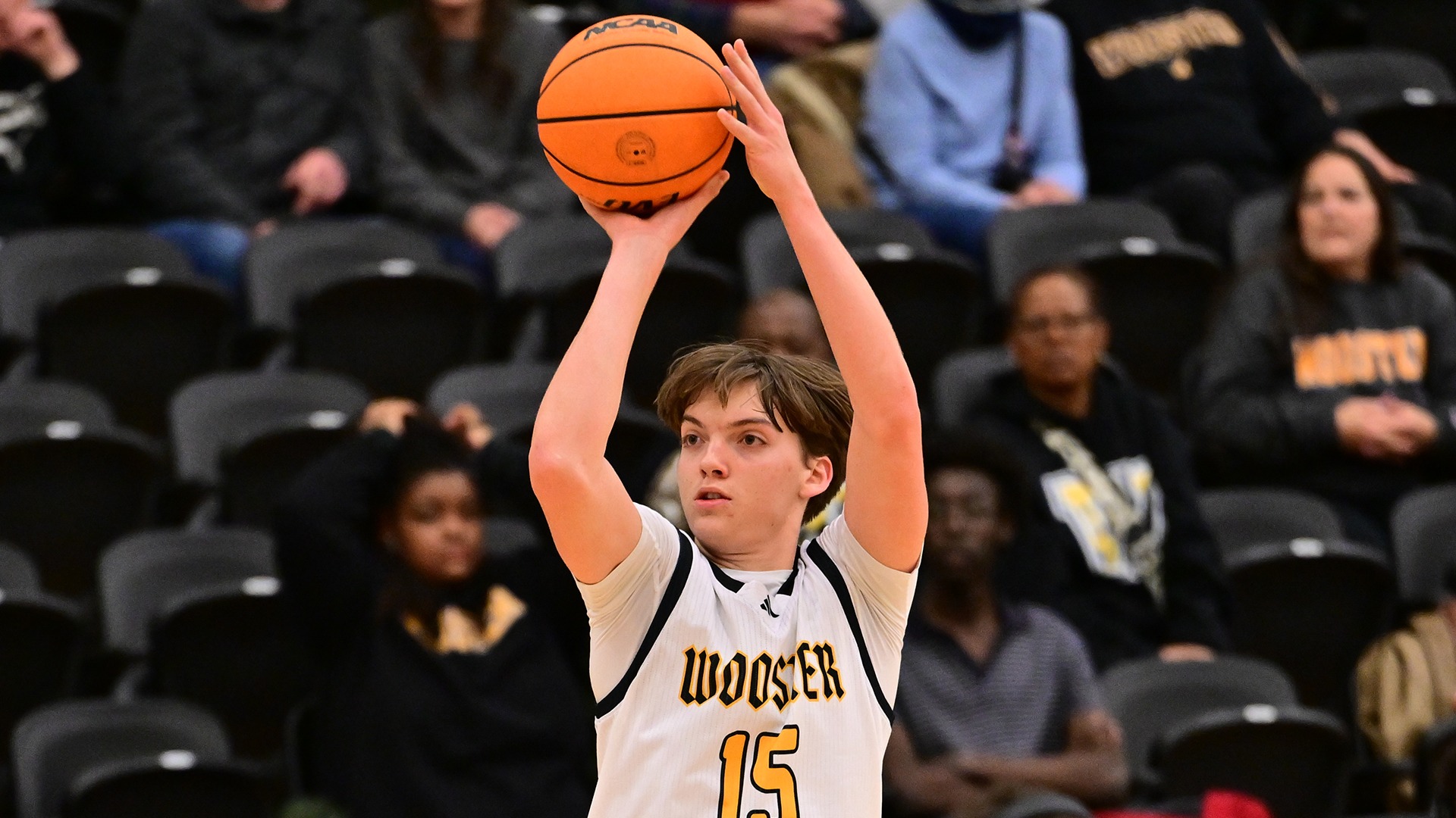 Breckman Oakley shoots a 3-pointer against Wittenberg in a 2026 game