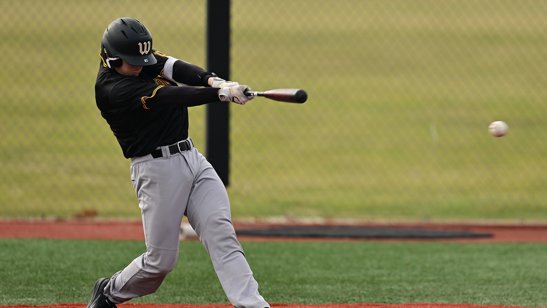 Colin Leslie puts the ball in play against La Roche in 2026