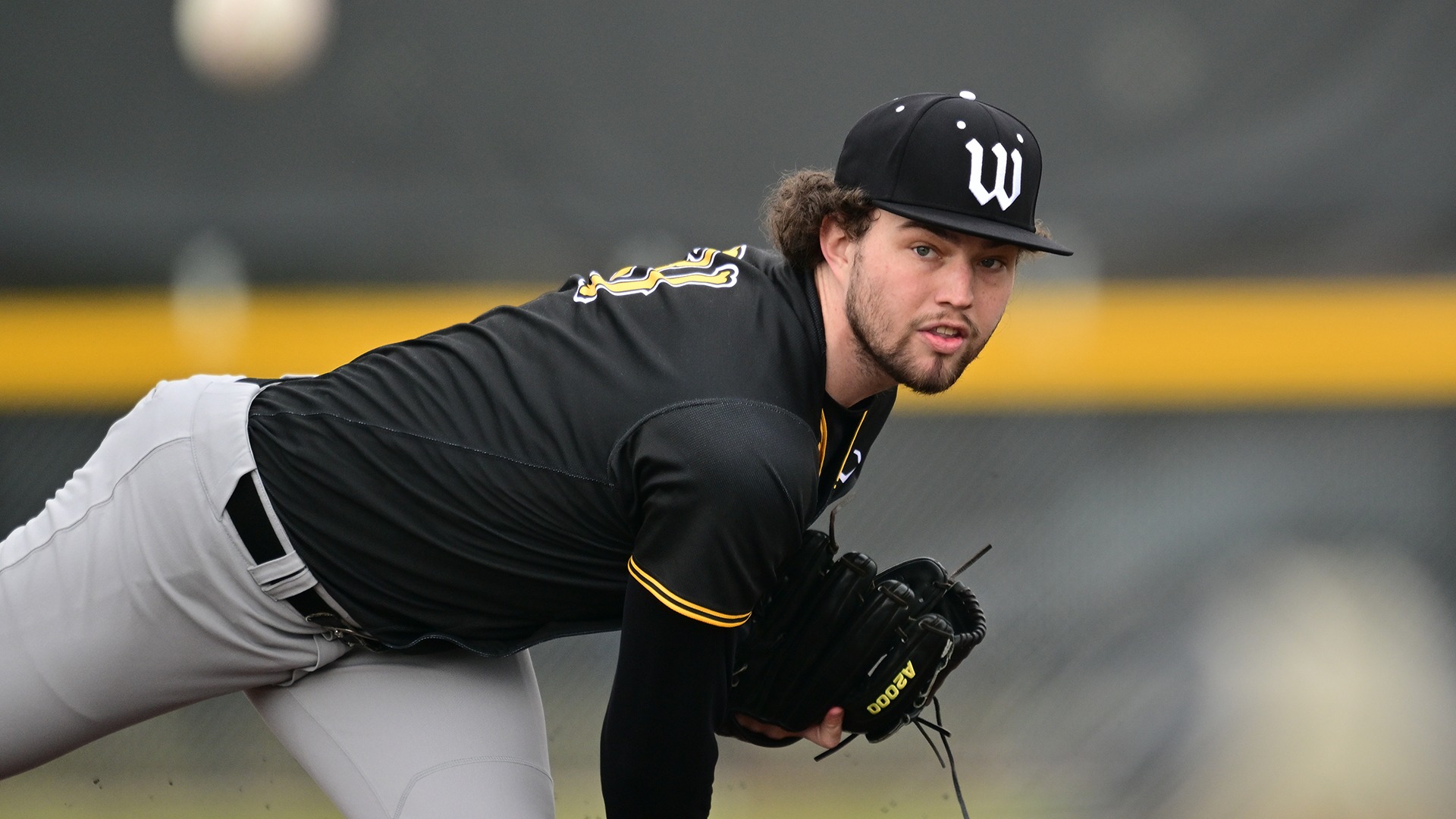Sophomore Alex Eusebio fires a pitch during a 2026 game against La Roche