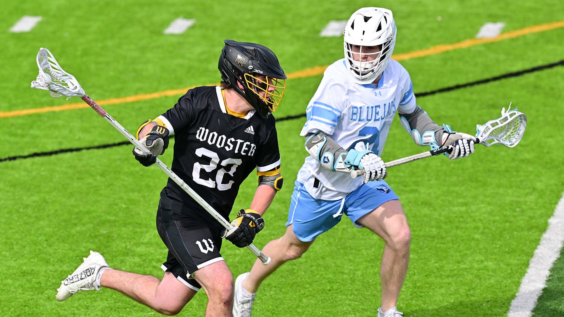 Domenic Cuda looks to work the ball past an Elmhurst defender in a 2026 game