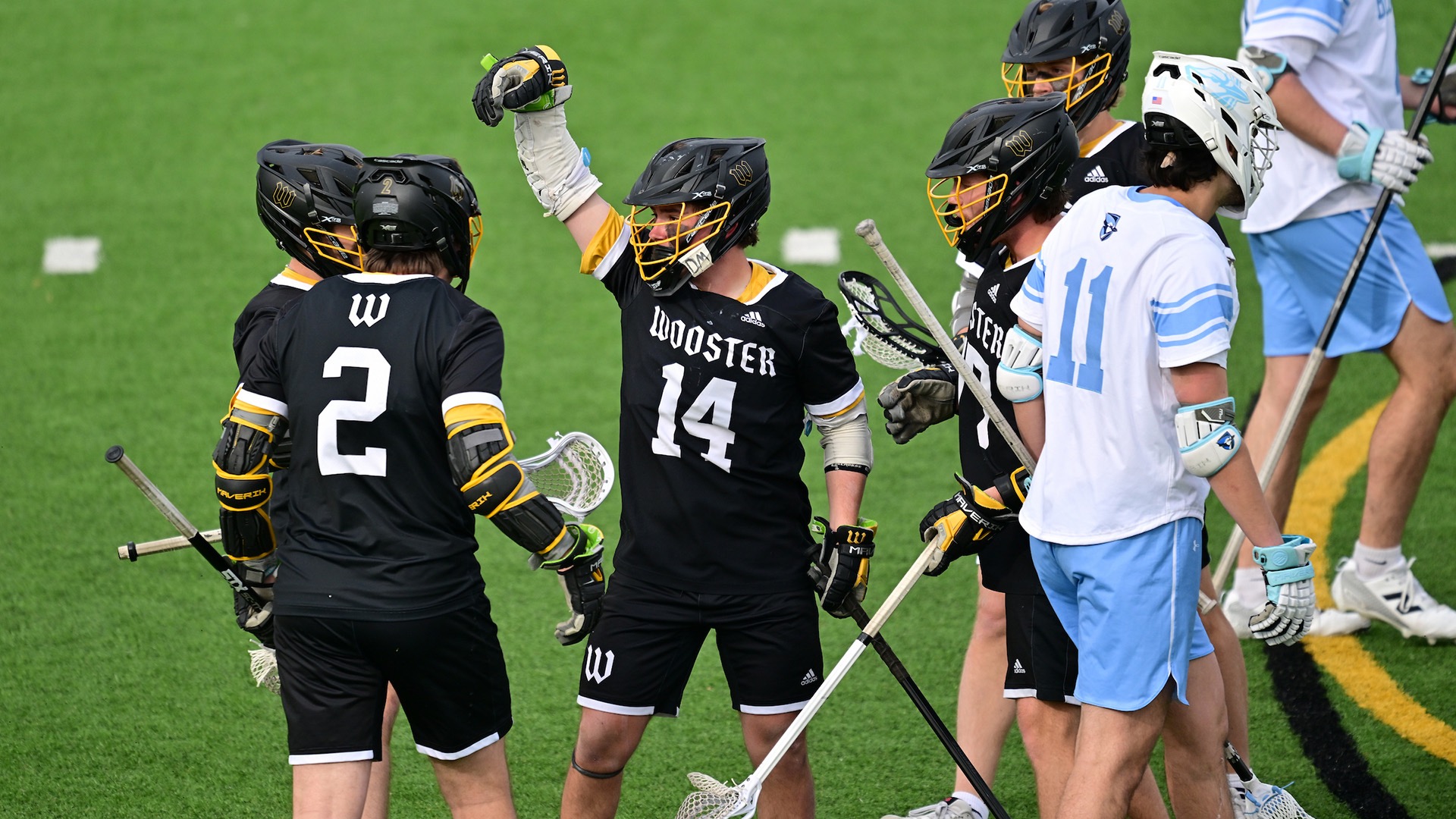 Jack Holub celebrates with his fist in the air