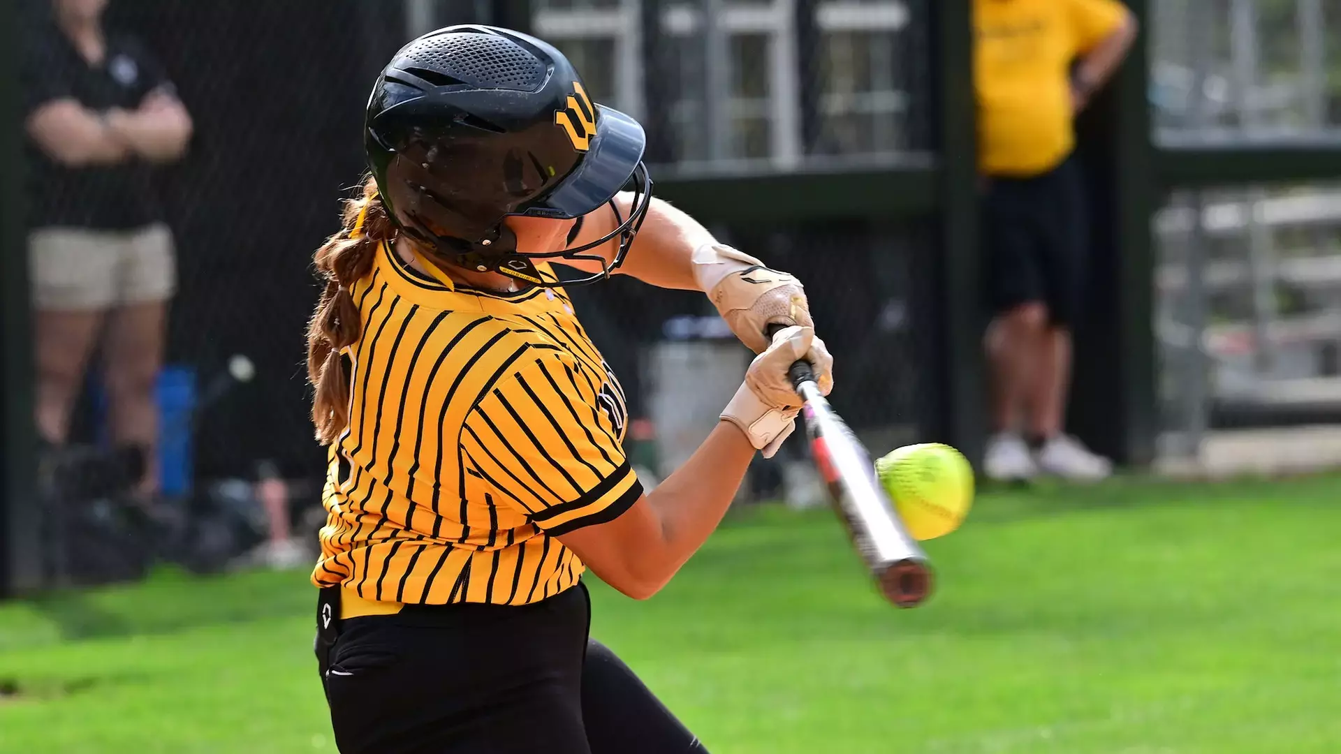 Sage Lammlein swings and connects on a pitch