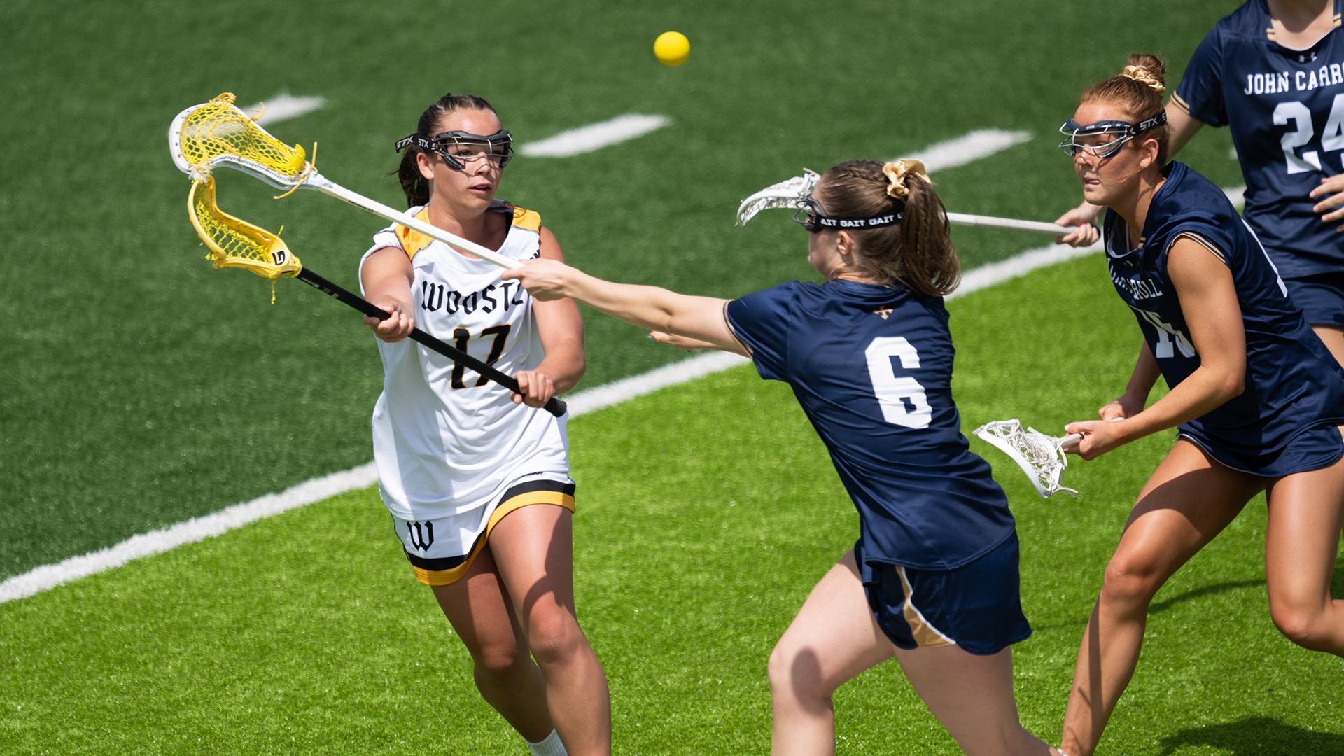 Kylie MacMillan makes a pass against John Carroll in a 2026 game