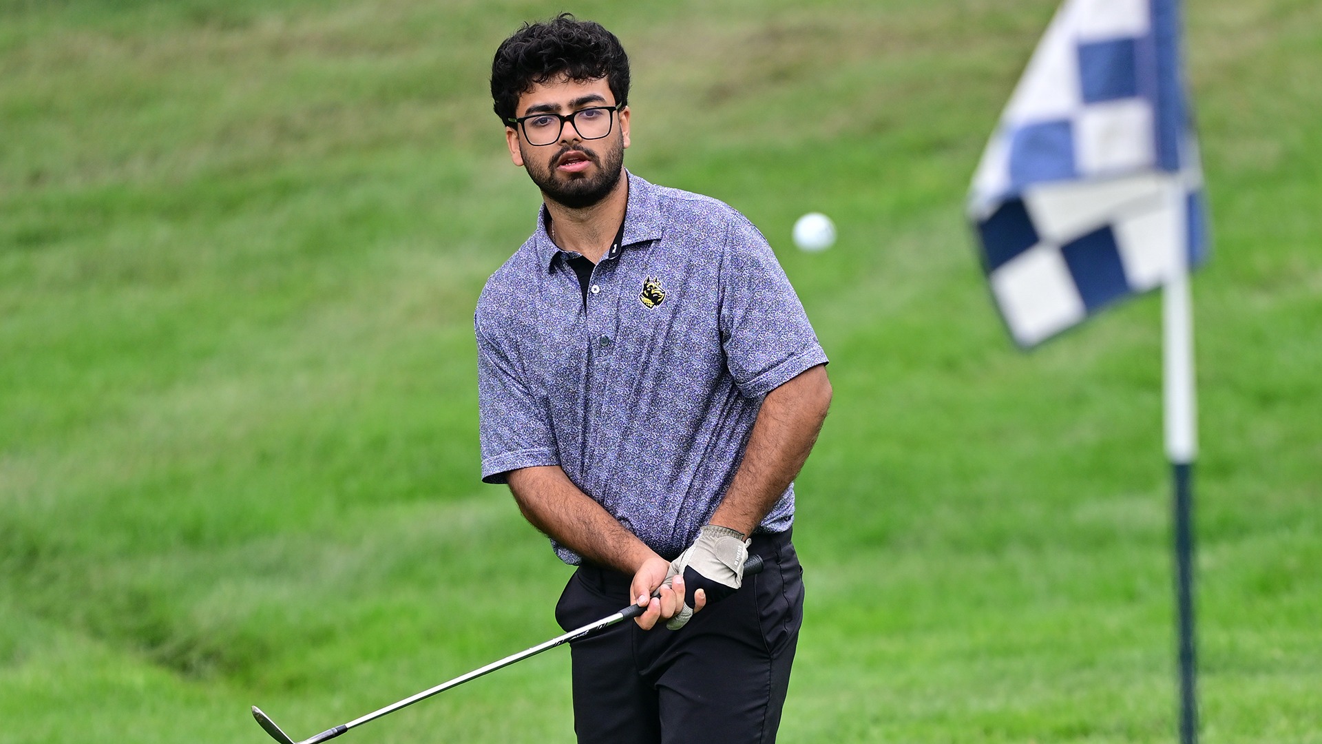 Arnav Choudhary hits a chip during the 2026 Nye Intercollegiate