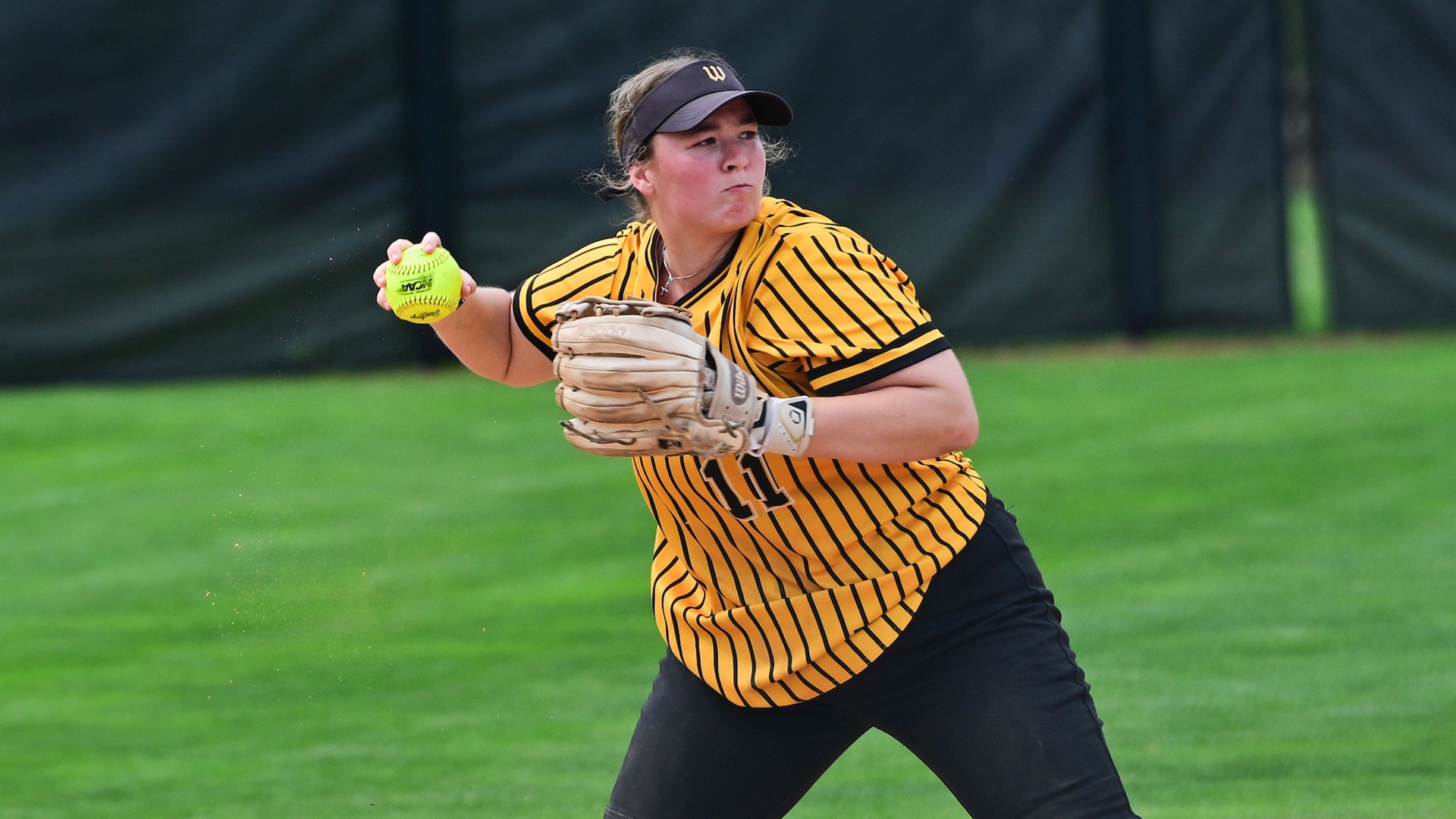 Julia Jennings turns to throw after fielding a ground ball