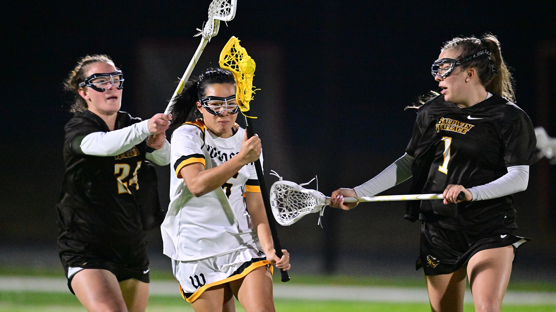 Nicole McCalla looks to navigate through Baldwin Wallace's defense in a 2026 game