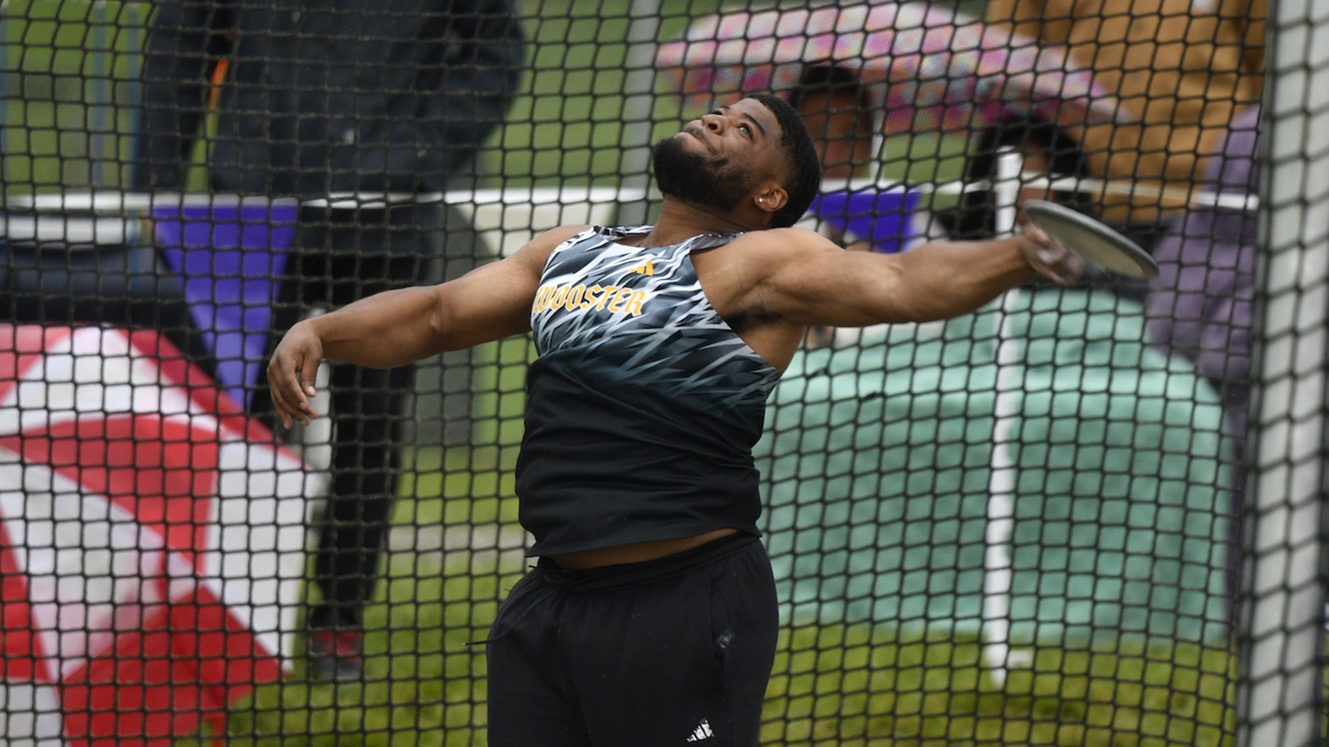 Rob Mays III throws the discus at the NCAC Outdoor Championships