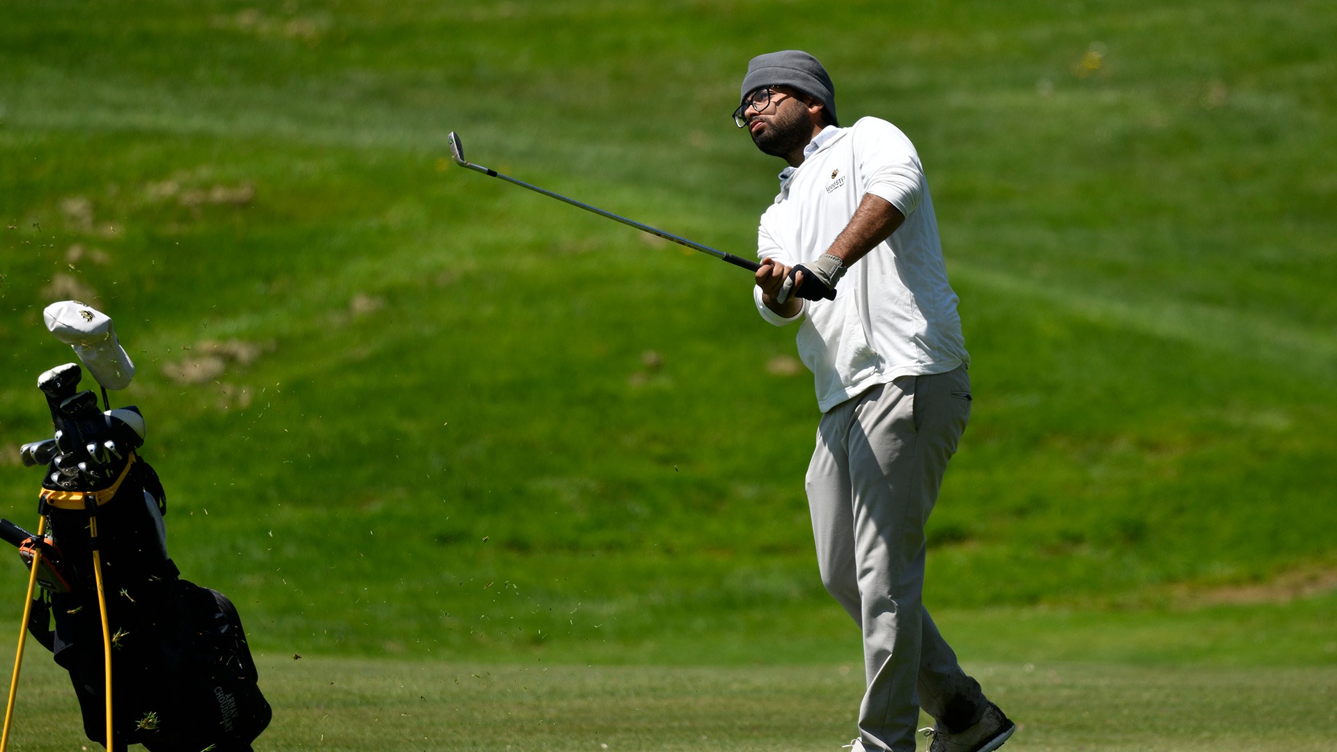Arnav Choudhary watches his wedge shot on the 18th hole at the 2026 NCAC Championship