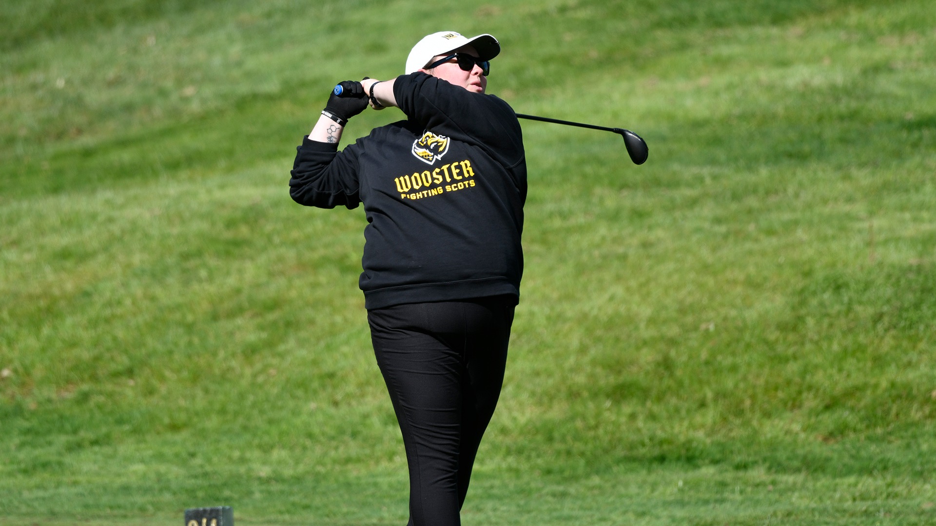 Abby Haywood follows through on a tee shot during the 2026 NCAC Championship
