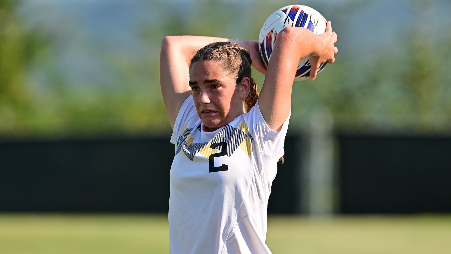Hannah Lindberg prepares to throw the ball in from the sideline
