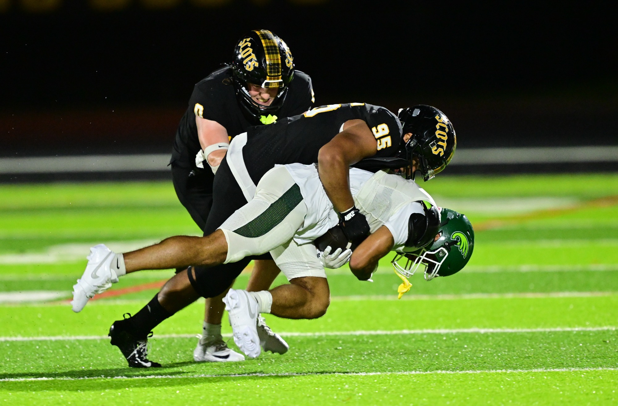 action photo of Jacob Dudek making a tackle against Wilmington in 2026
