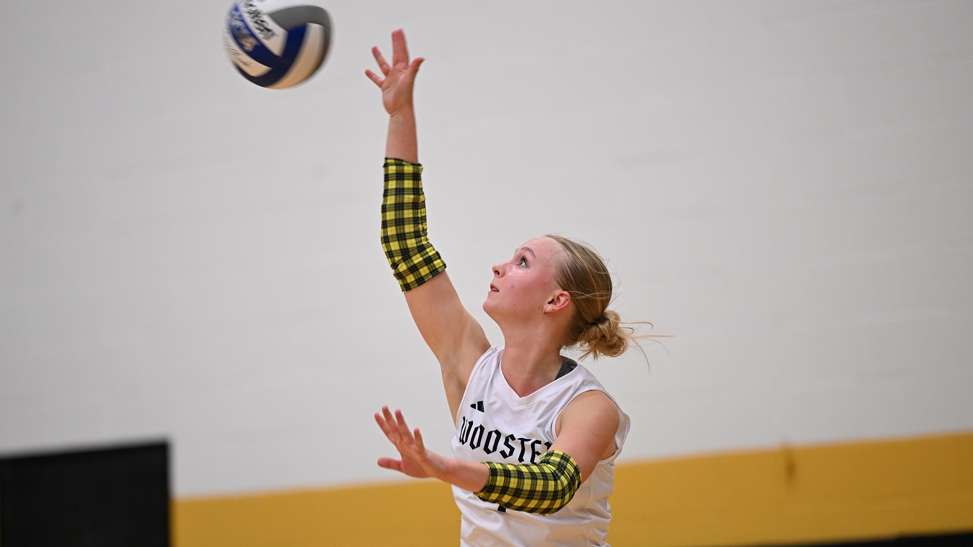 action photo of Jordan Laraway serving a volleyball against Allegheny in a 2026 match.